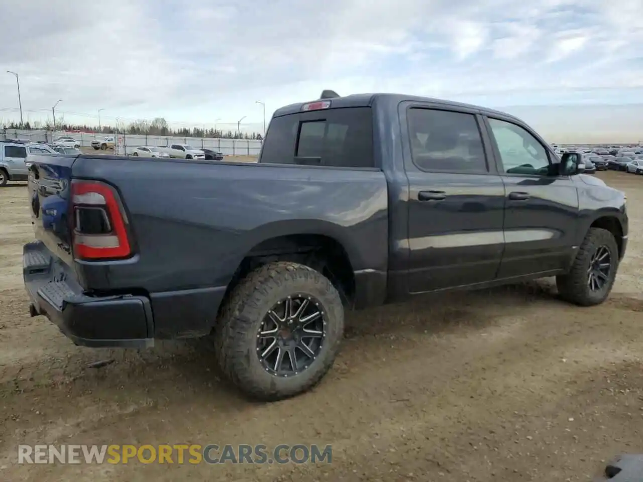 3 Photograph of a damaged car 1C6SRFLT5KN743550 RAM 1500 2019