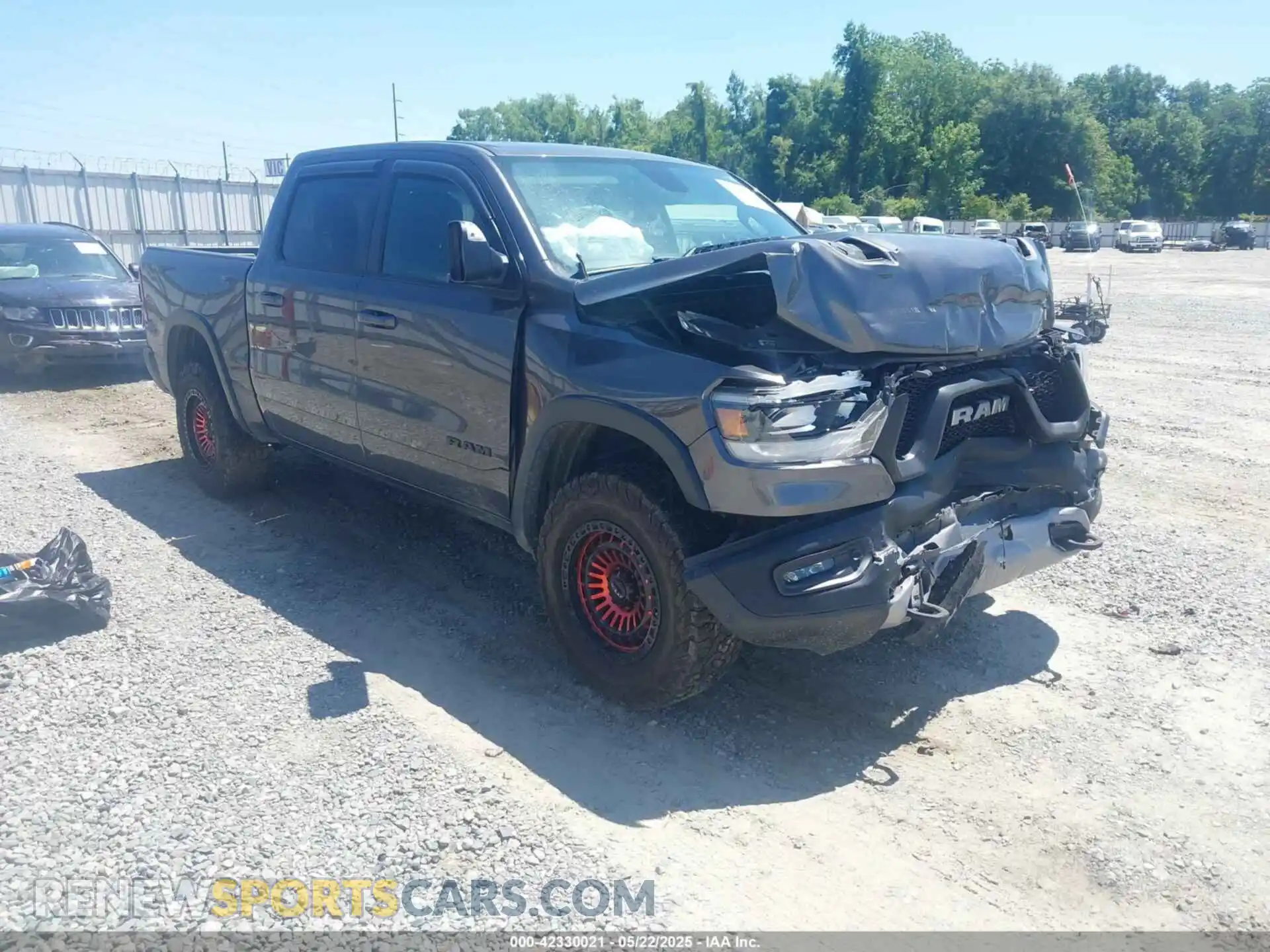 1 Photograph of a damaged car 1C6SRFLT5KN749669 RAM 1500 2019