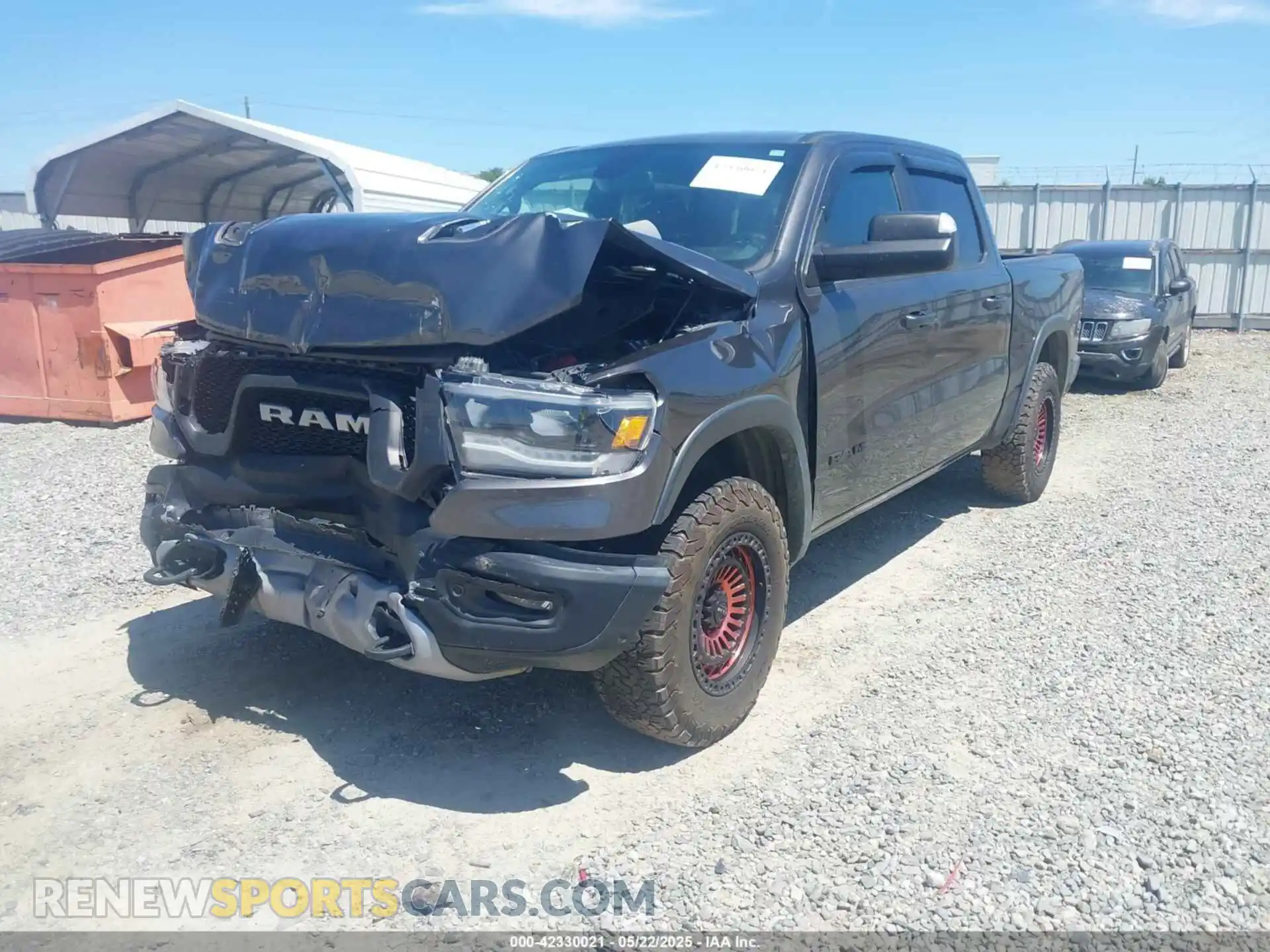 2 Photograph of a damaged car 1C6SRFLT5KN749669 RAM 1500 2019