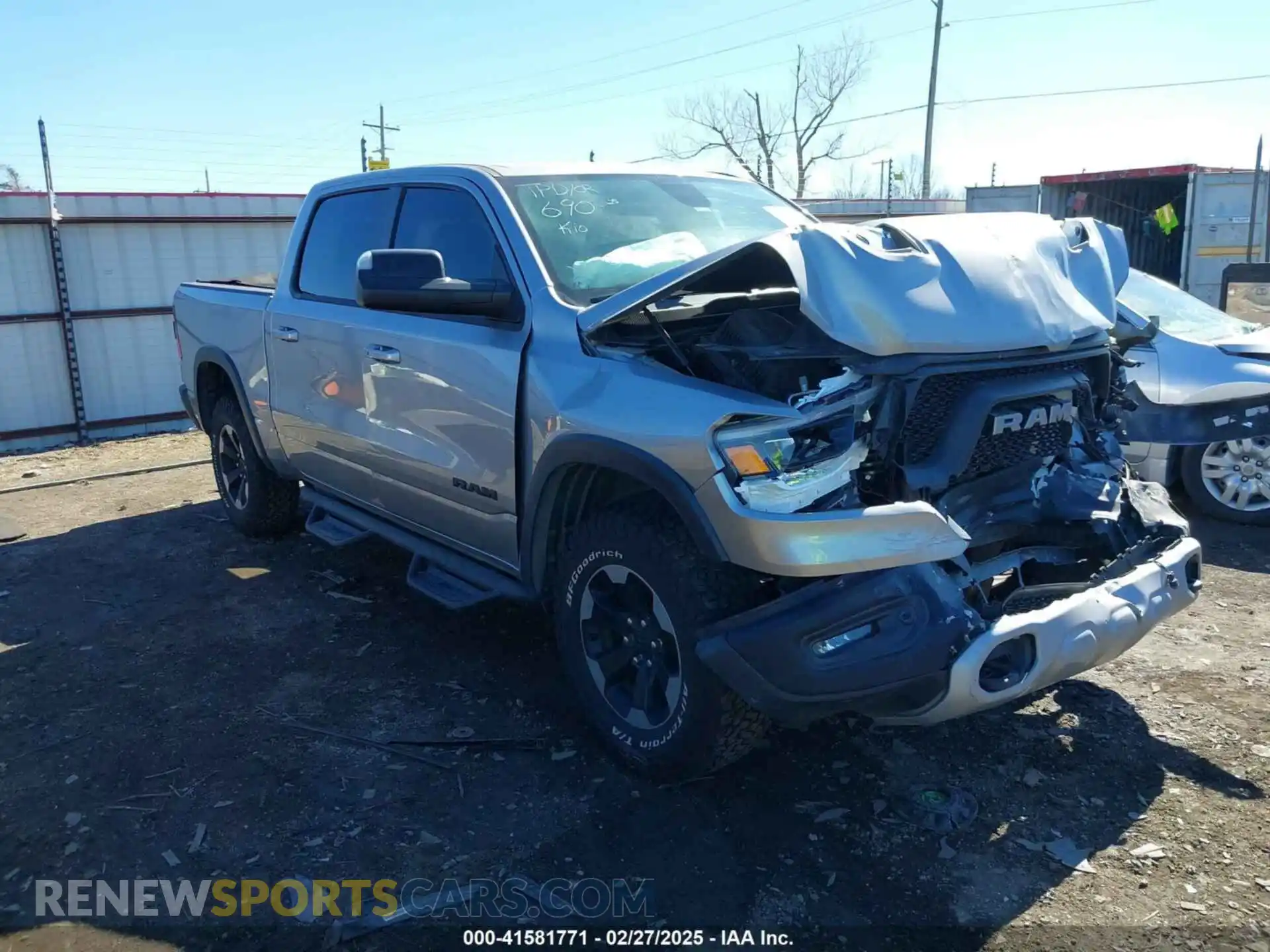 1 Photograph of a damaged car 1C6SRFLT6KN618346 RAM 1500 2019