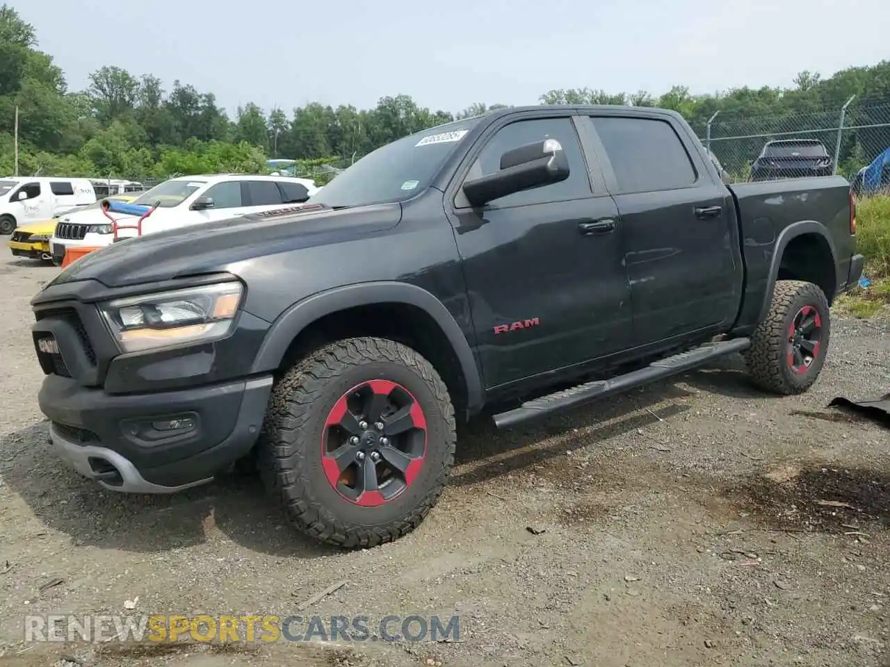 1 Photograph of a damaged car 1C6SRFLT6KN722481 RAM 1500 2019
