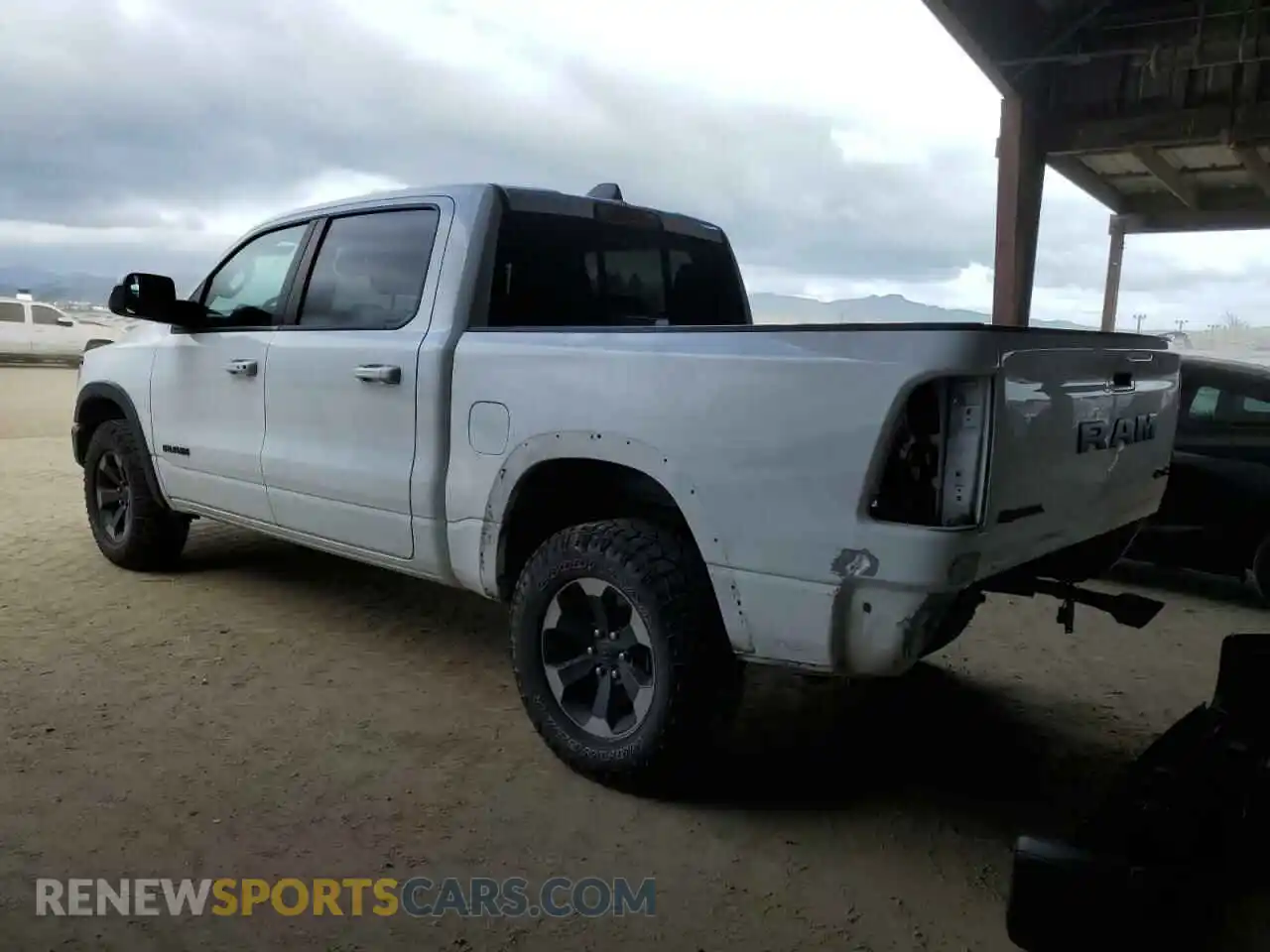 2 Photograph of a damaged car 1C6SRFLTXKN618849 RAM 1500 2019