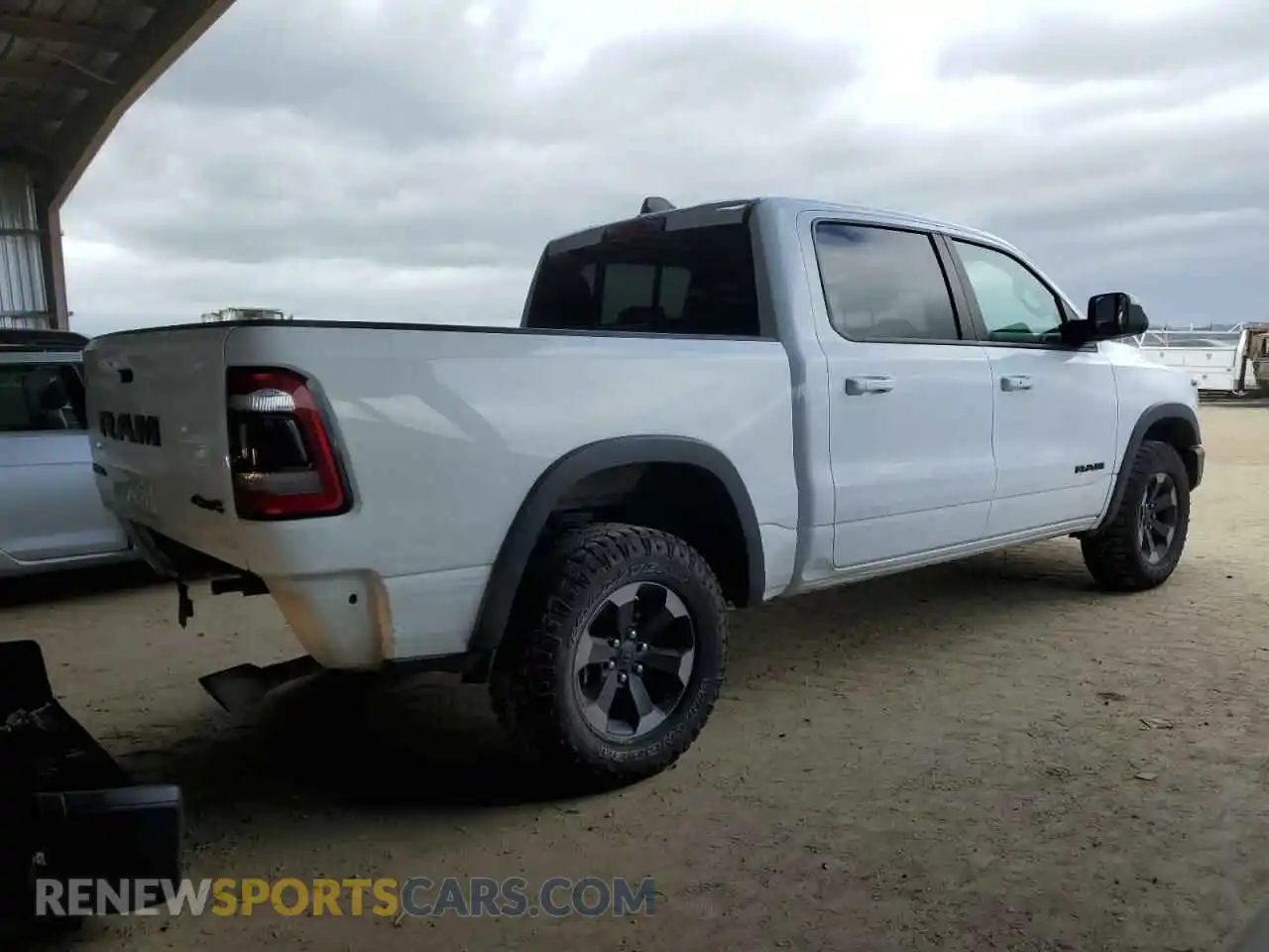 3 Photograph of a damaged car 1C6SRFLTXKN618849 RAM 1500 2019