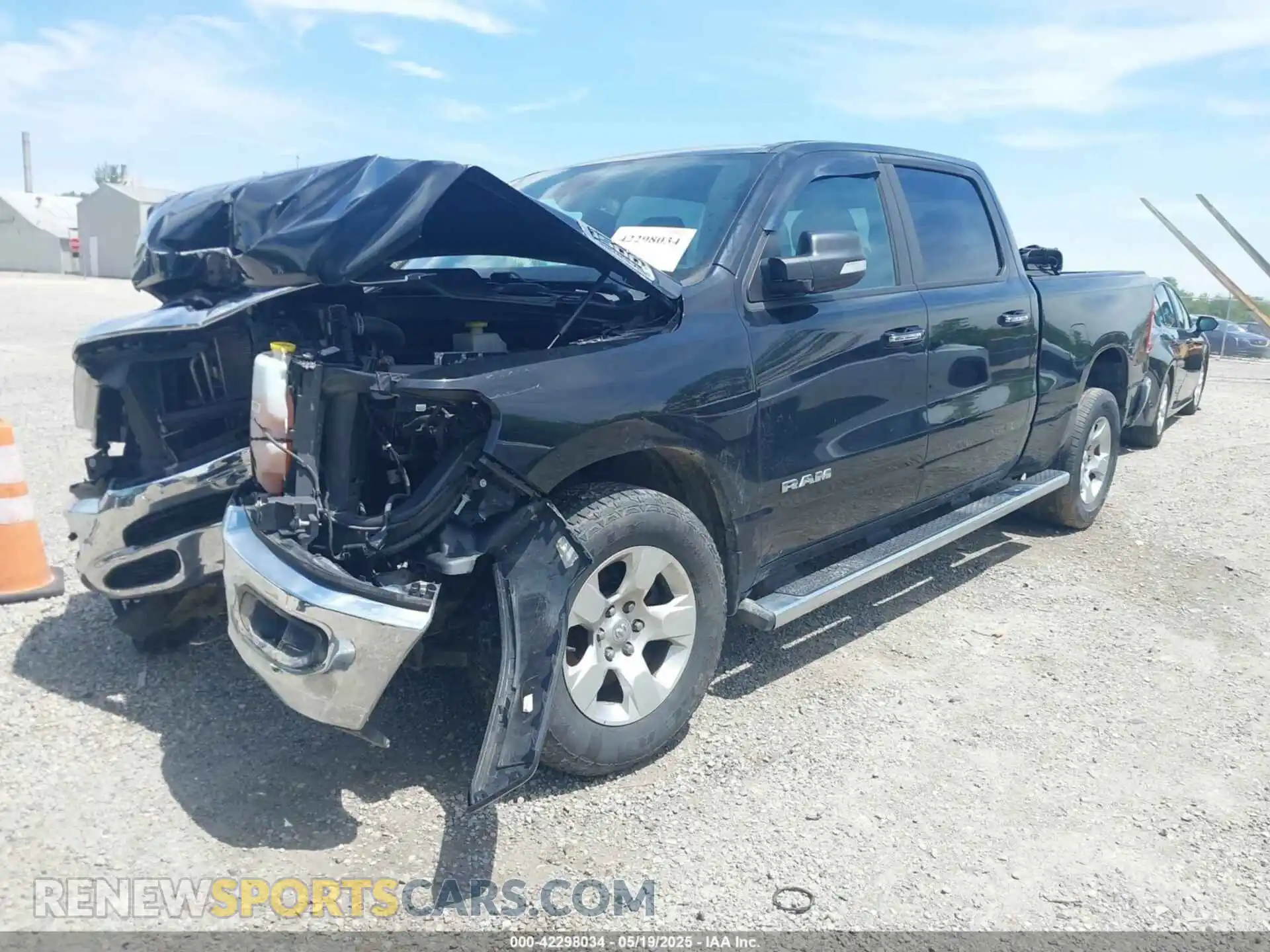 2 Photograph of a damaged car 1C6SRFMT0KN698483 RAM 1500 2019