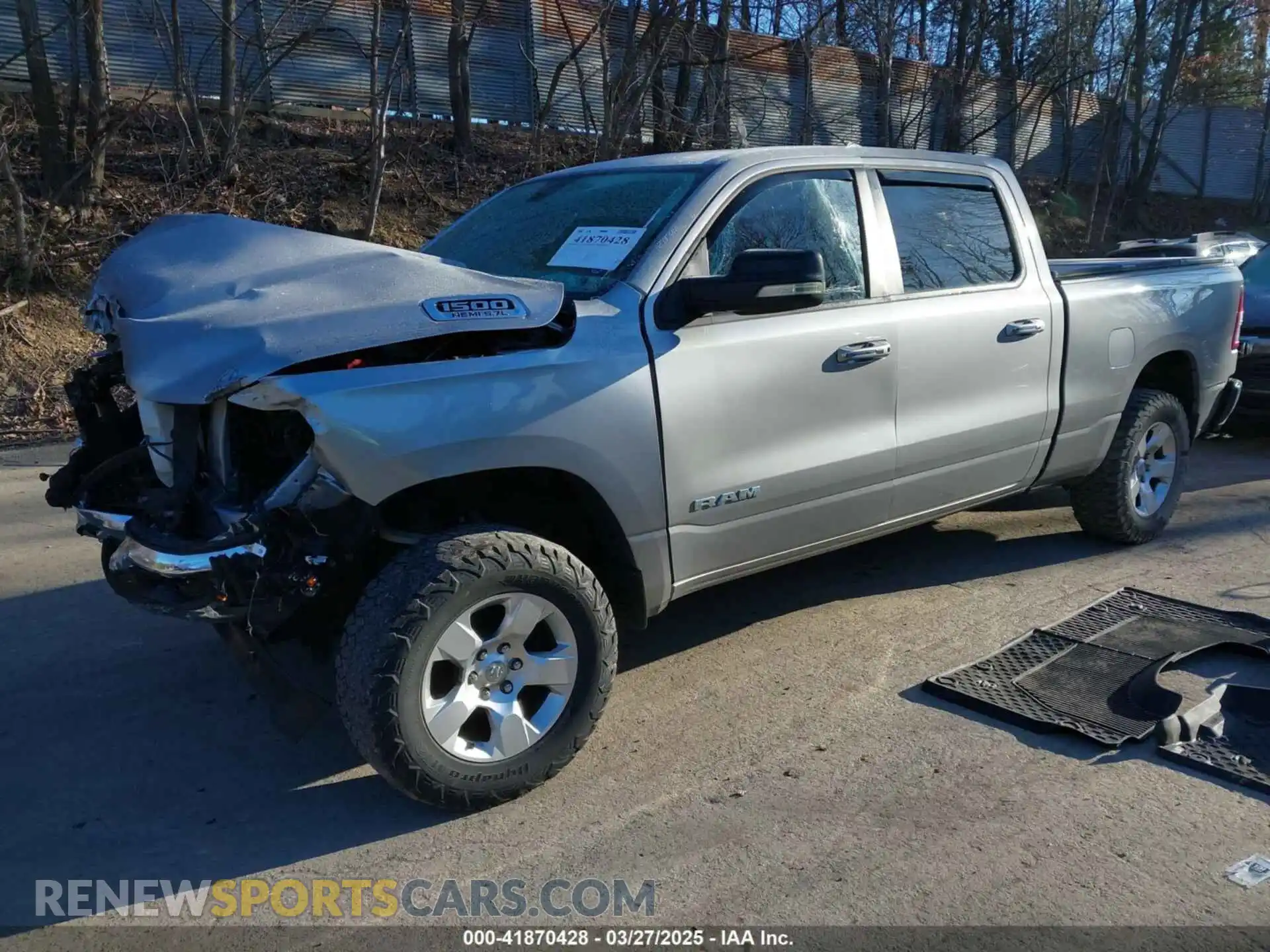 2 Photograph of a damaged car 1C6SRFMT0KN755152 RAM 1500 2019