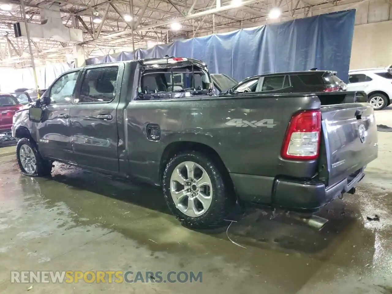 2 Photograph of a damaged car 1C6SRFMT3KN691897 RAM 1500 2019