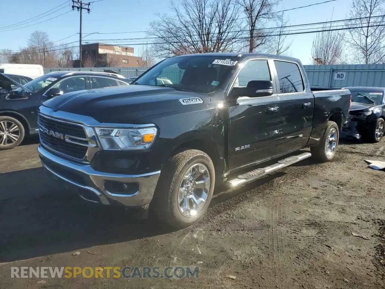 1 Photograph of a damaged car 1C6SRFMT4KN917820 RAM 1500 2019