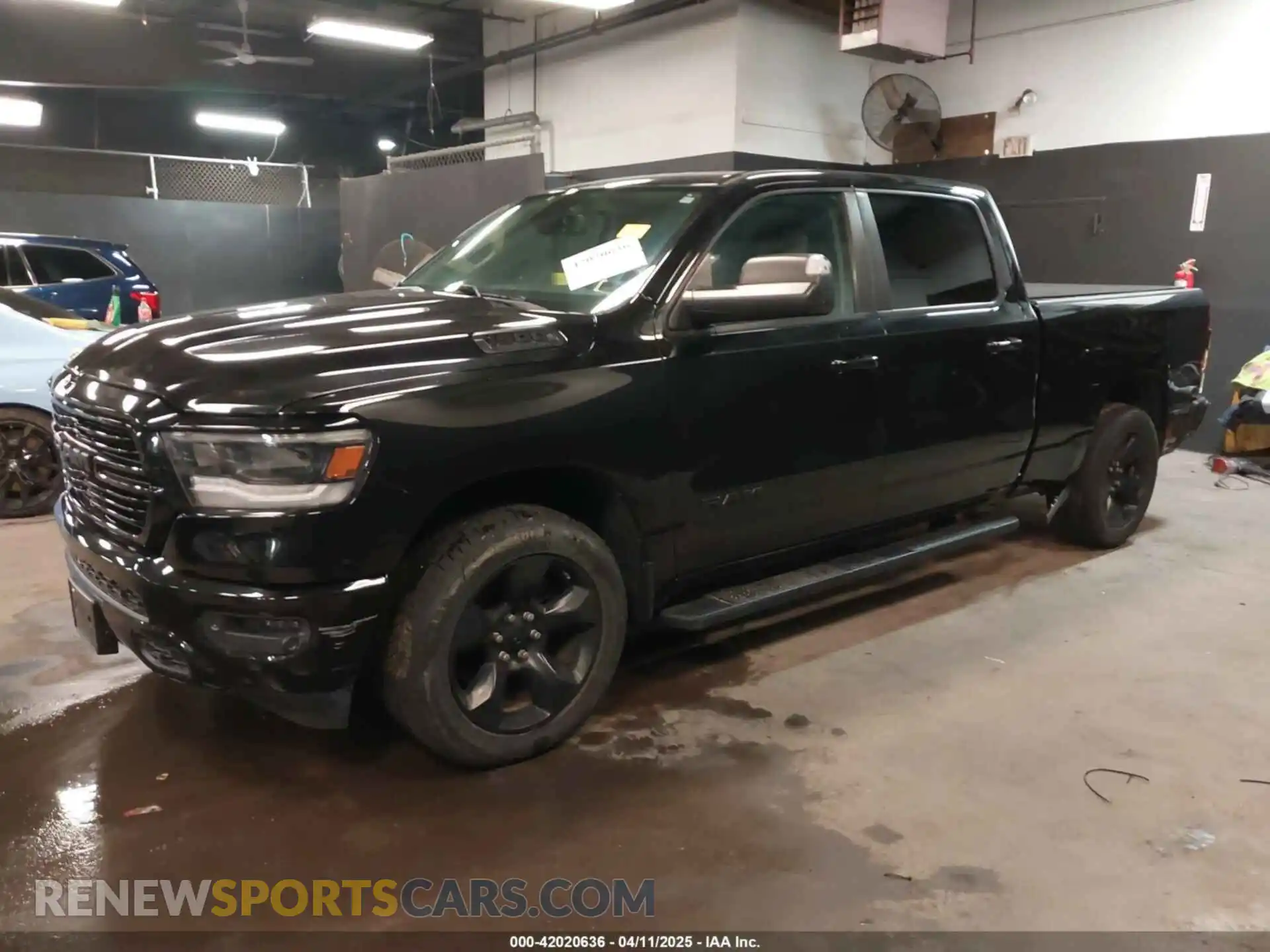 2 Photograph of a damaged car 1C6SRFMT5KN614044 RAM 1500 2019