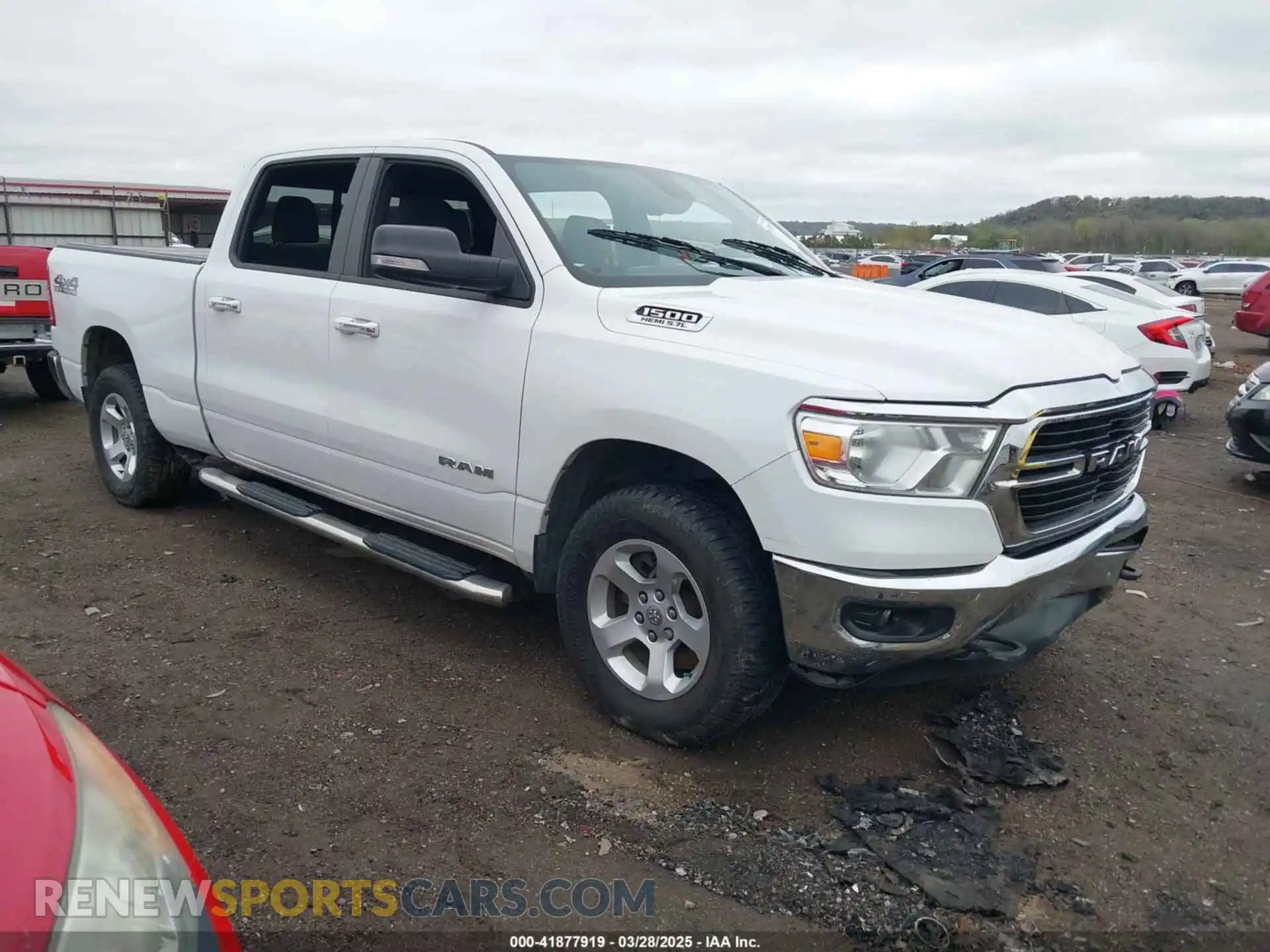 1 Photograph of a damaged car 1C6SRFMT5KN719697 RAM 1500 2019