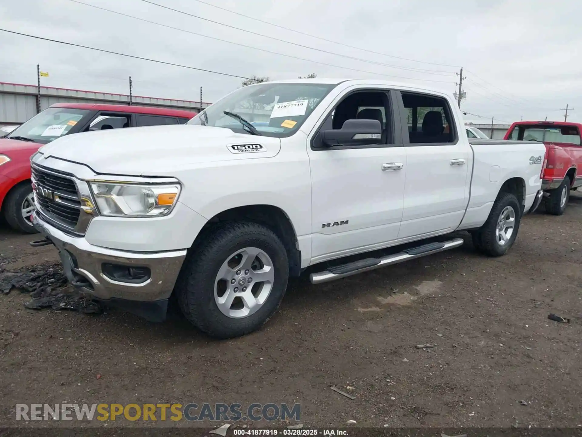 2 Photograph of a damaged car 1C6SRFMT5KN719697 RAM 1500 2019
