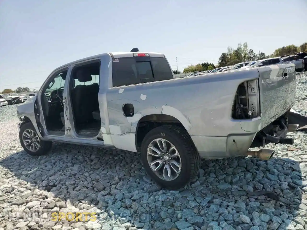 2 Photograph of a damaged car 1C6SRFMT6KN637557 RAM 1500 2019
