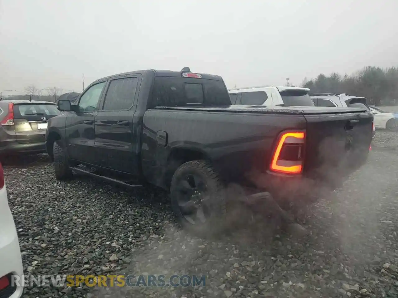 2 Photograph of a damaged car 1C6SRFMT8KN848209 RAM 1500 2019