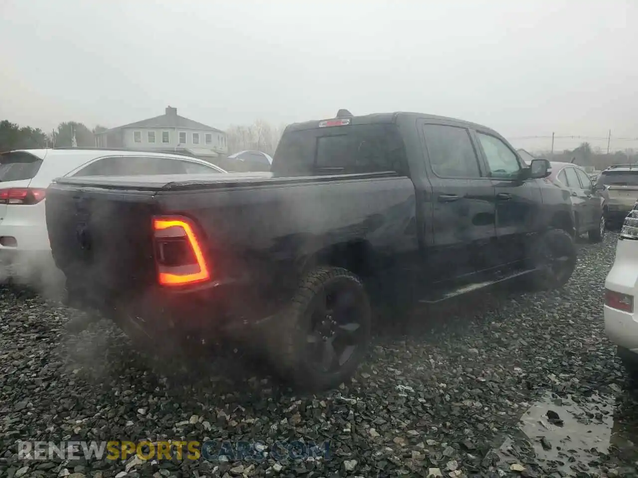 3 Photograph of a damaged car 1C6SRFMT8KN848209 RAM 1500 2019