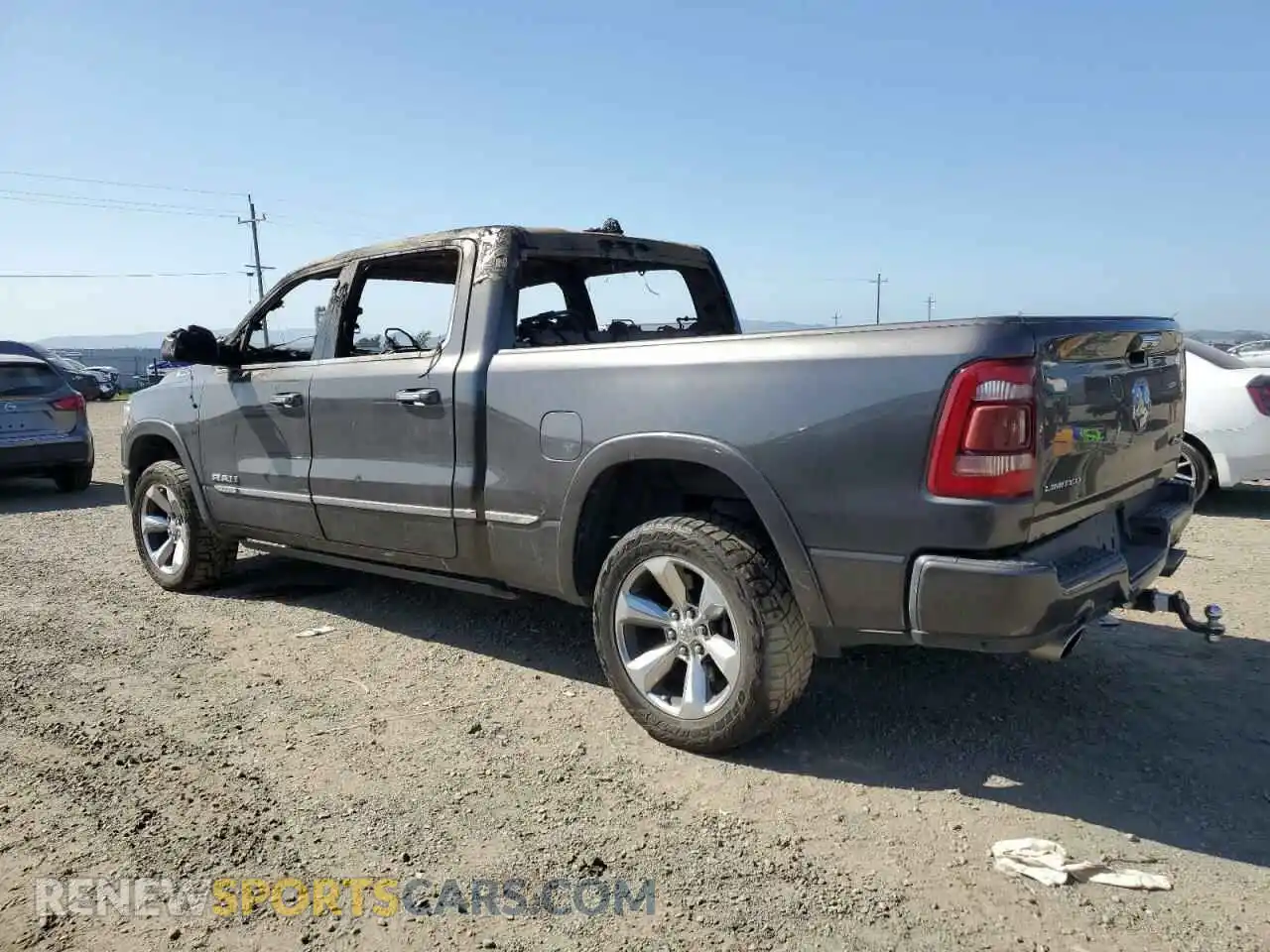 2 Photograph of a damaged car 1C6SRFPT2KN829974 RAM 1500 2019