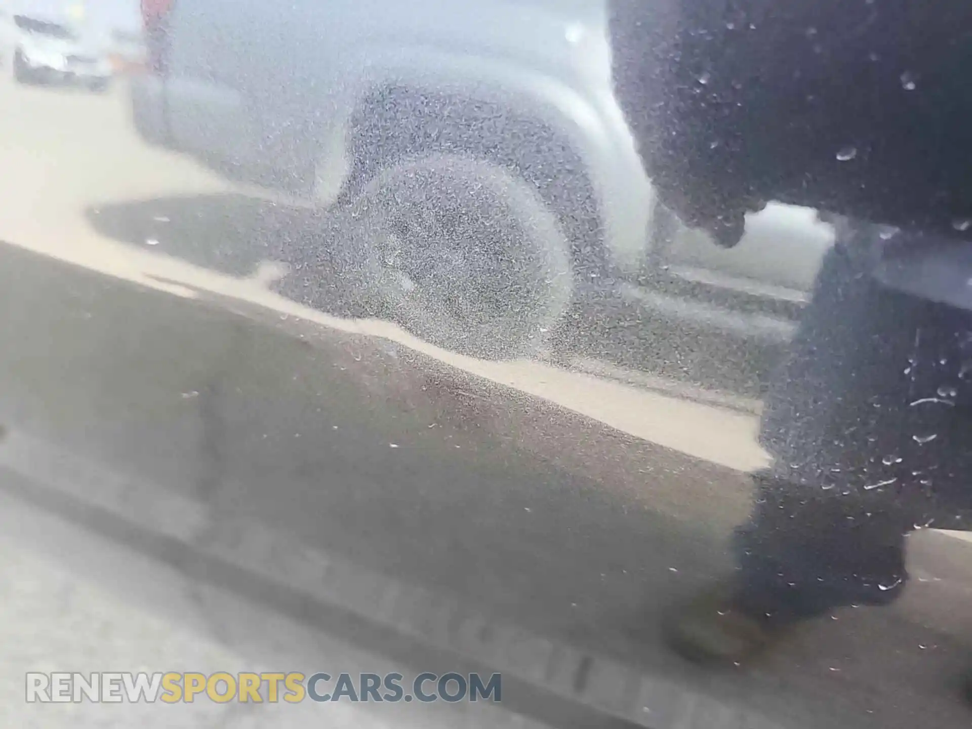 1 Photograph of a damaged car 1C6SRFRT0KN882945 RAM 1500 2019