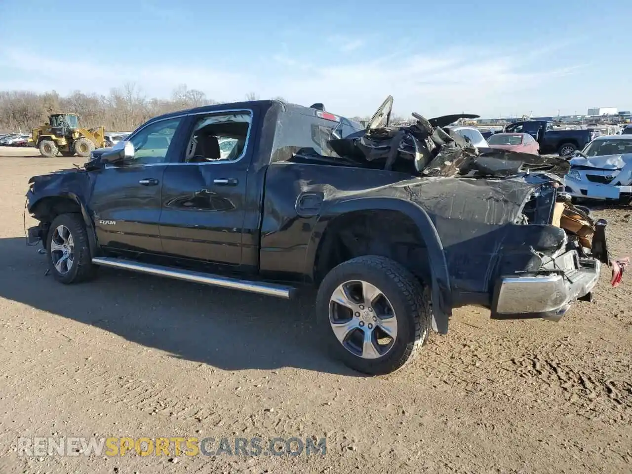 2 Photograph of a damaged car 1C6SRFRT2KN665459 RAM 1500 2019