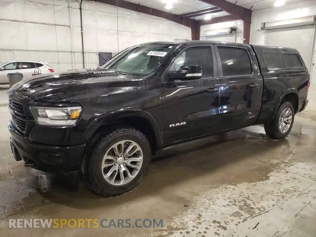 1 Photograph of a damaged car 1C6SRFRT4KN871625 RAM 1500 2019