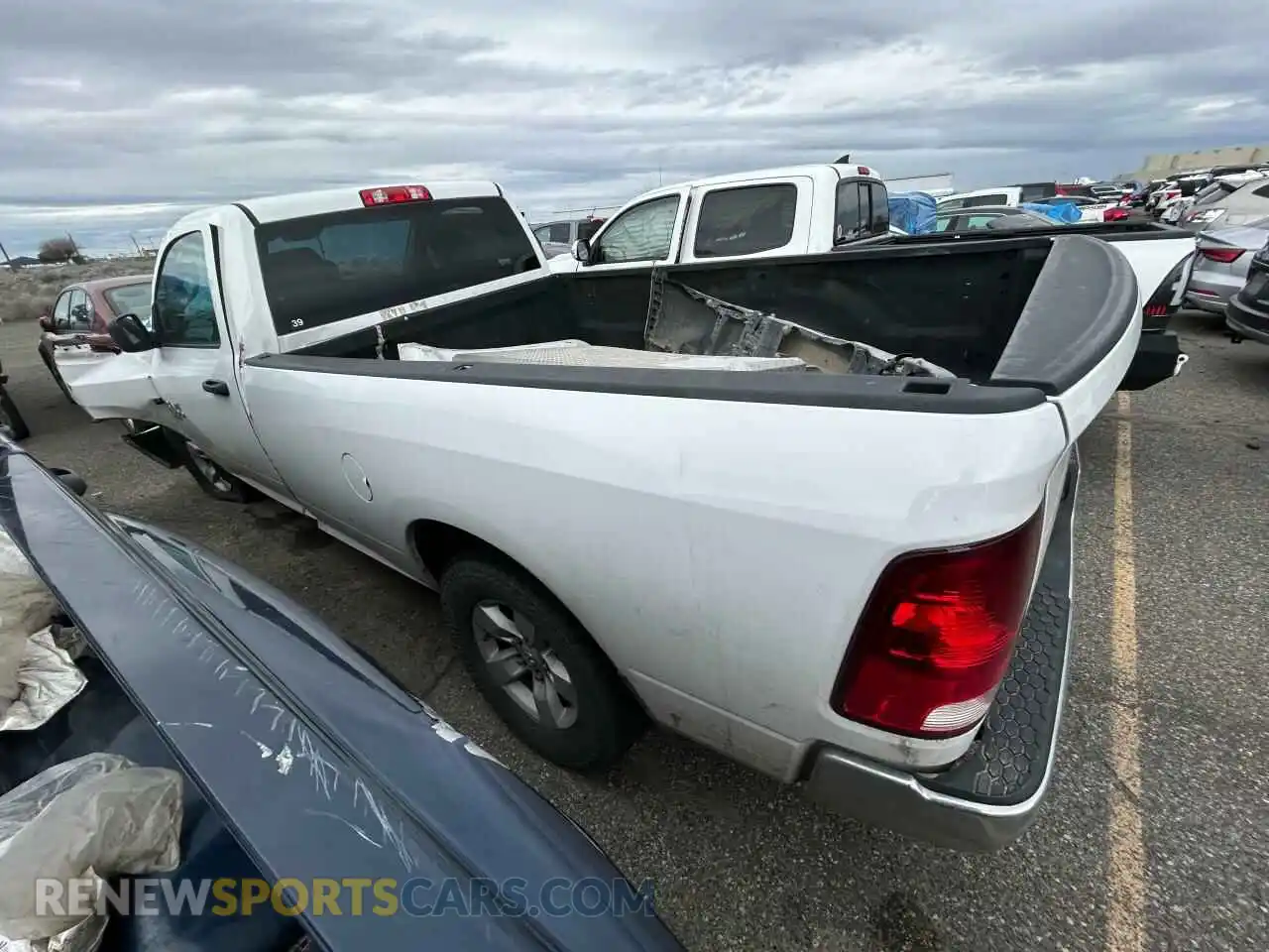 2 Photograph of a damaged car 3C6JR6DT8KG702235 RAM 1500 2019