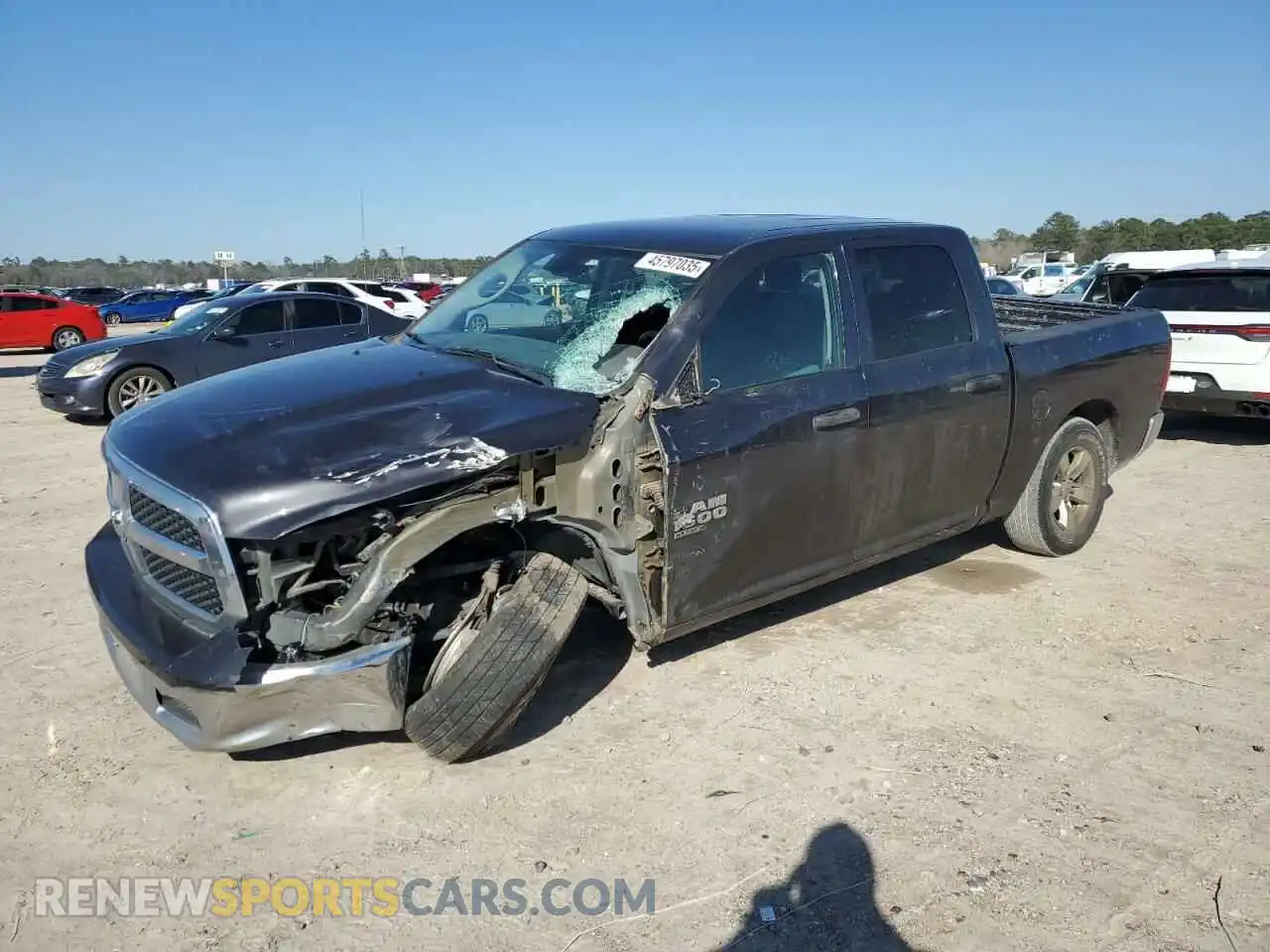 1 Photograph of a damaged car 3C6RR6KG3KG690083 RAM 1500 2019
