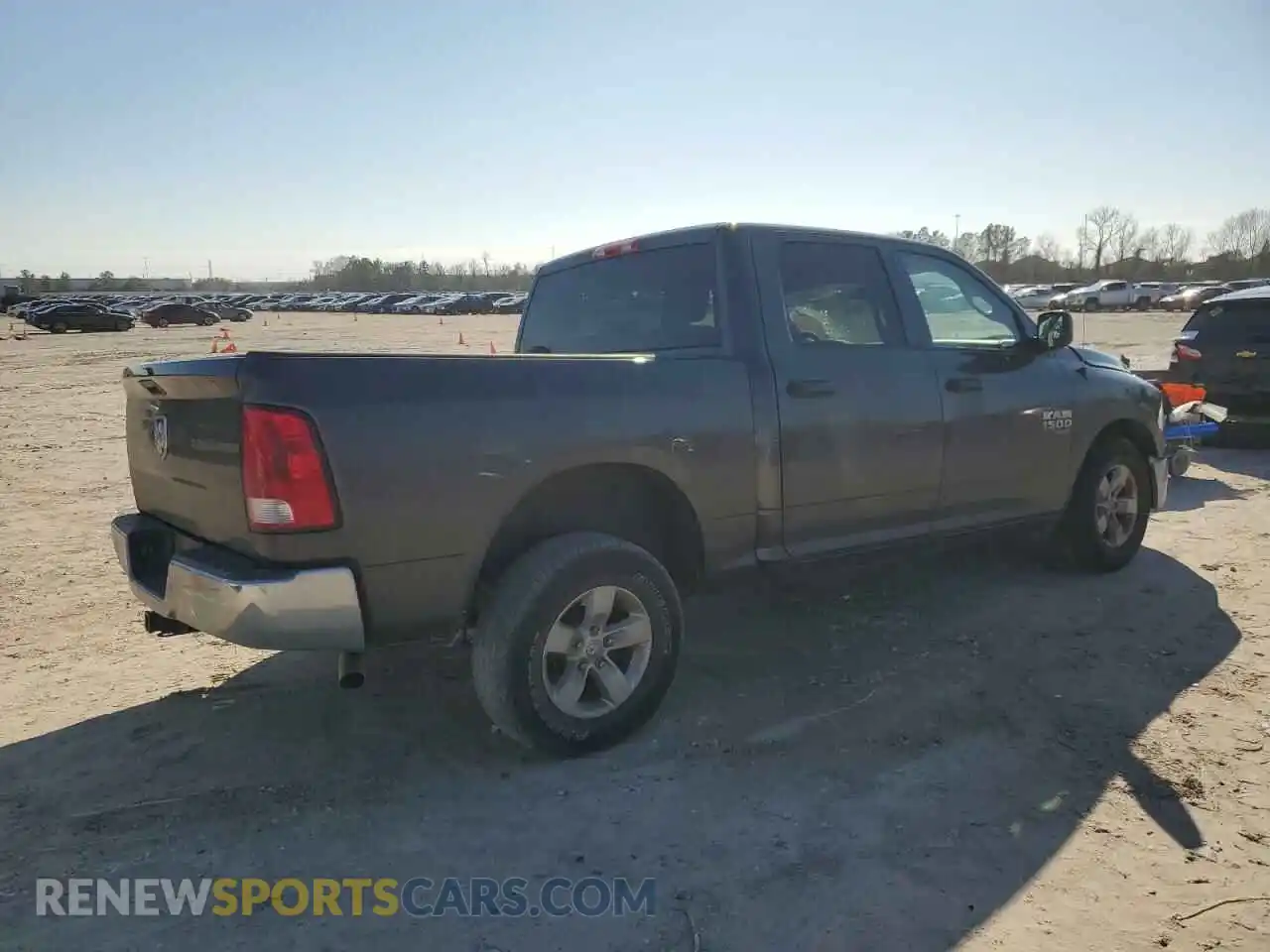 3 Photograph of a damaged car 3C6RR6KG3KG690083 RAM 1500 2019
