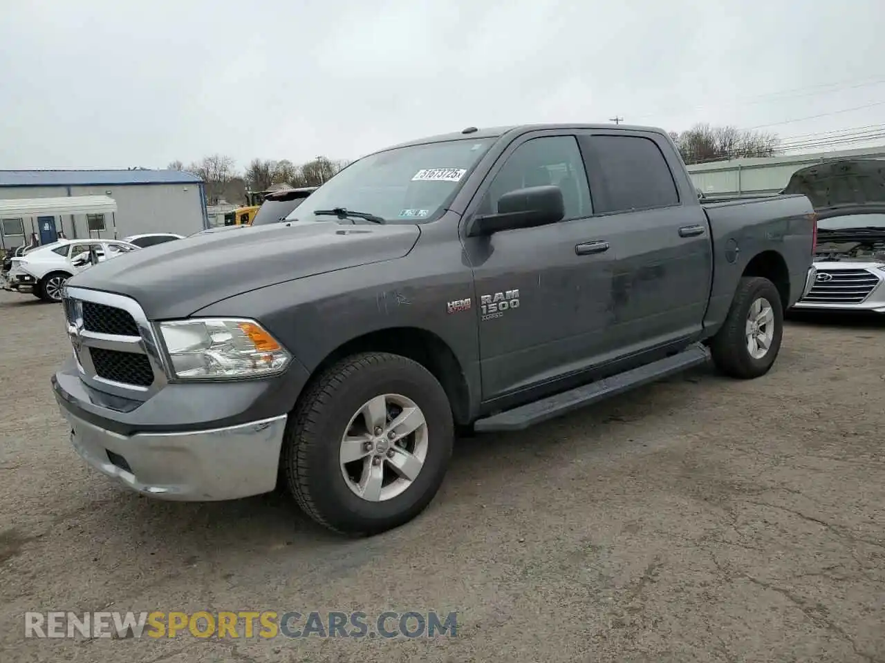 1 Photograph of a damaged car 3C6RR7LT8KG631273 RAM 1500 2019