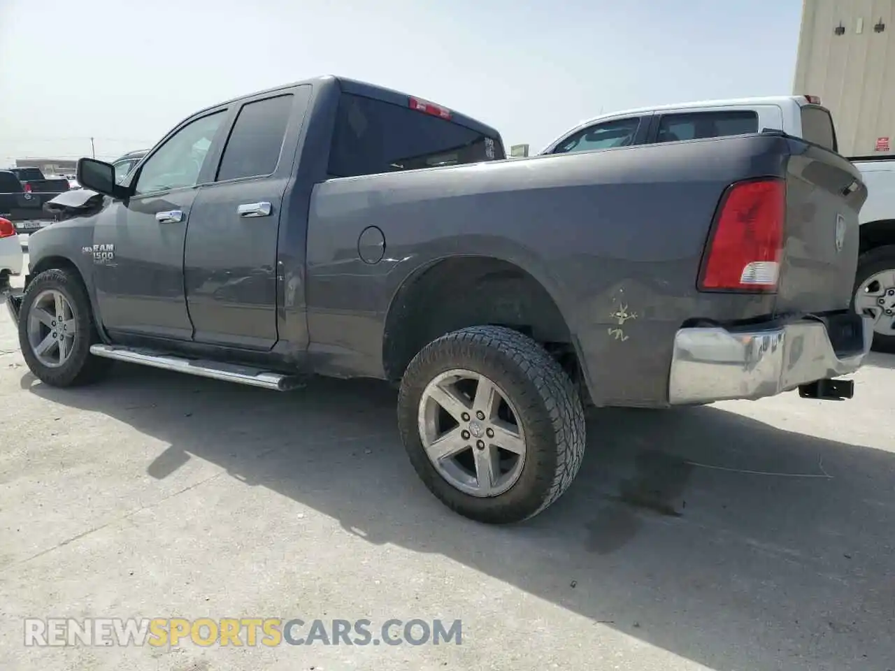 2 Photograph of a damaged car 1C6RR6FT9LS147970 RAM 1500 2020