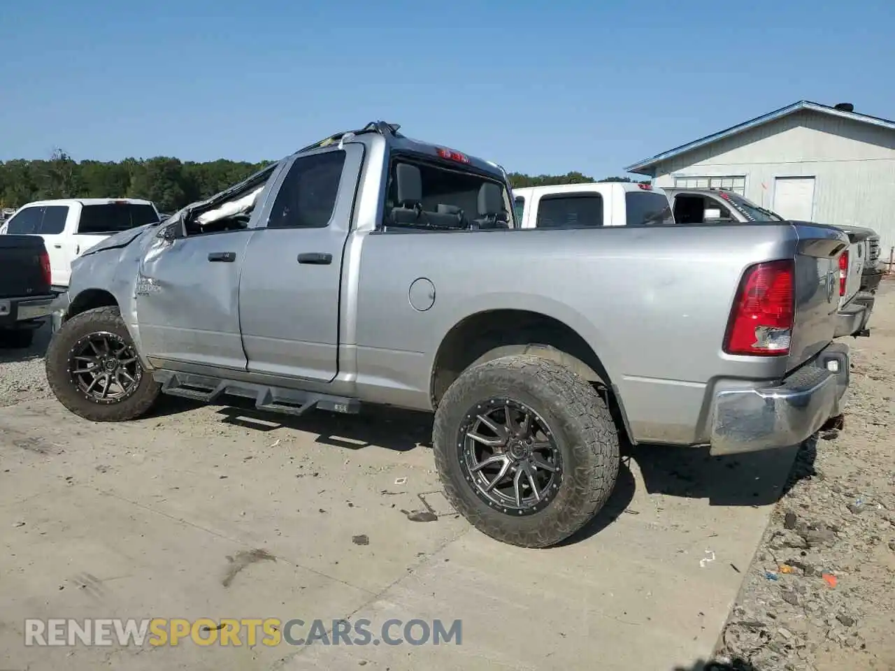 2 Photograph of a damaged car 1C6RR7FGXLS122472 RAM 1500 2020