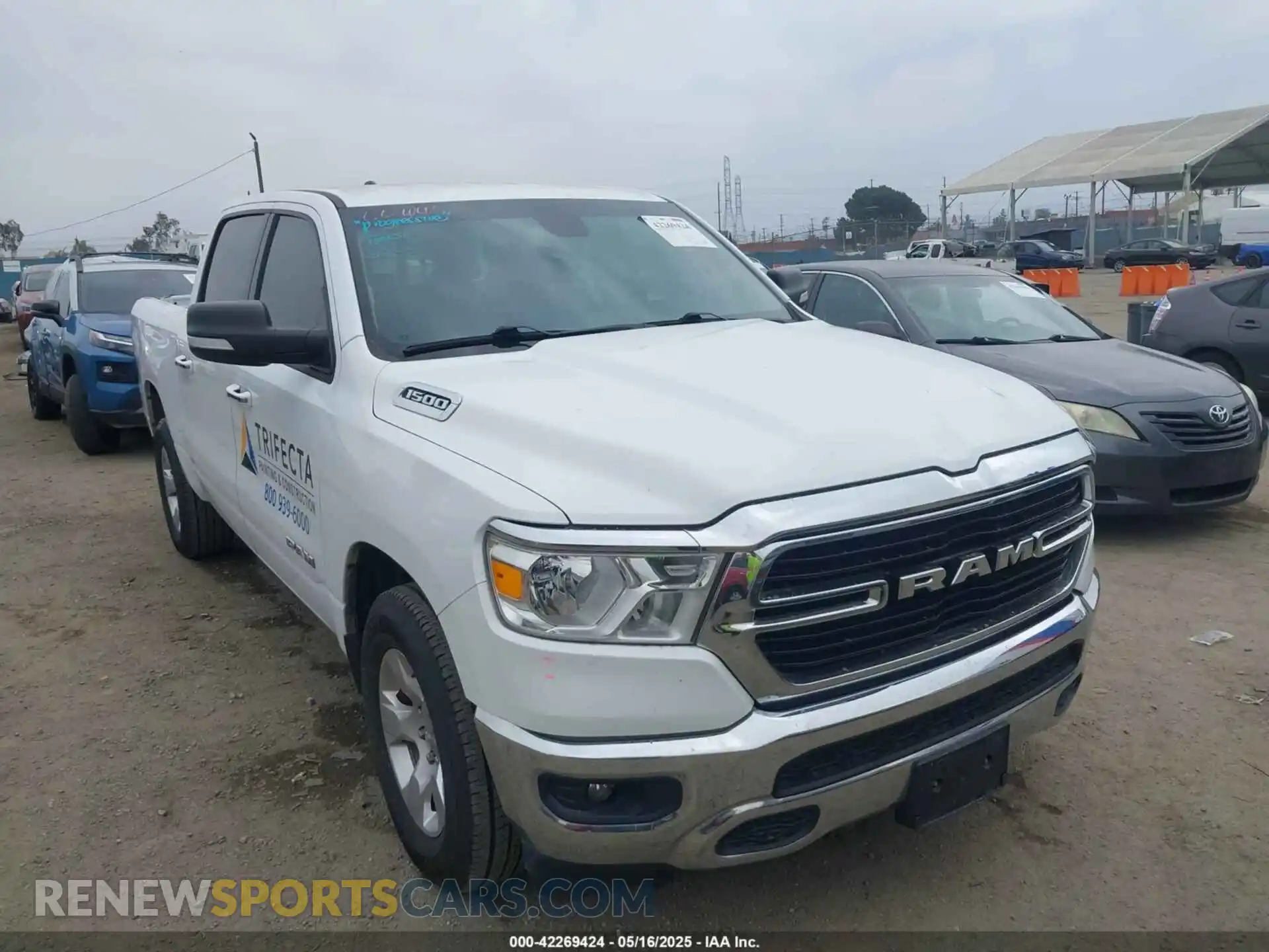 1 Photograph of a damaged car 1C6RREFG3LN129718 RAM 1500 2020