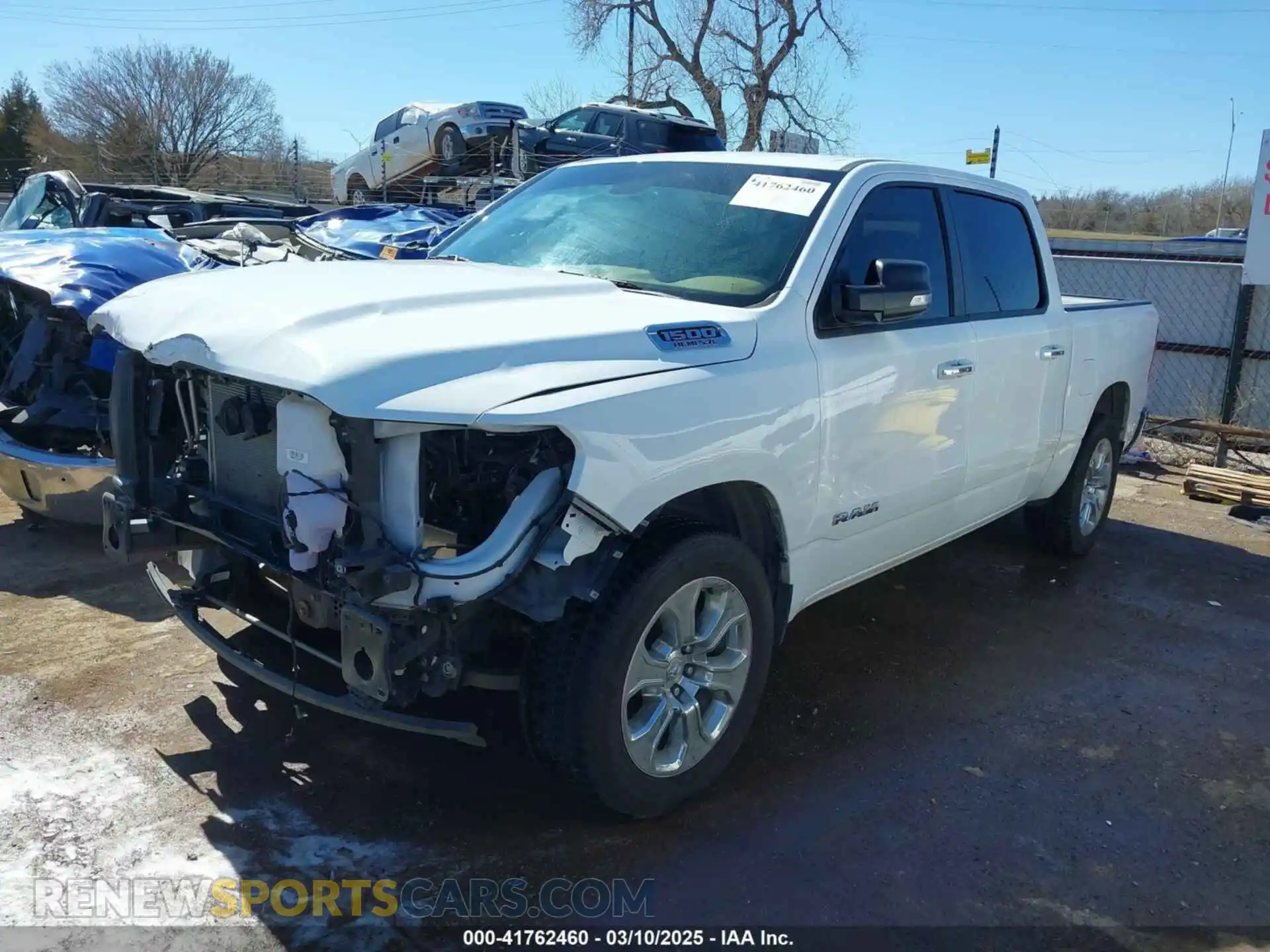 2 Photograph of a damaged car 1C6RREFT0LN311731 RAM 1500 2020