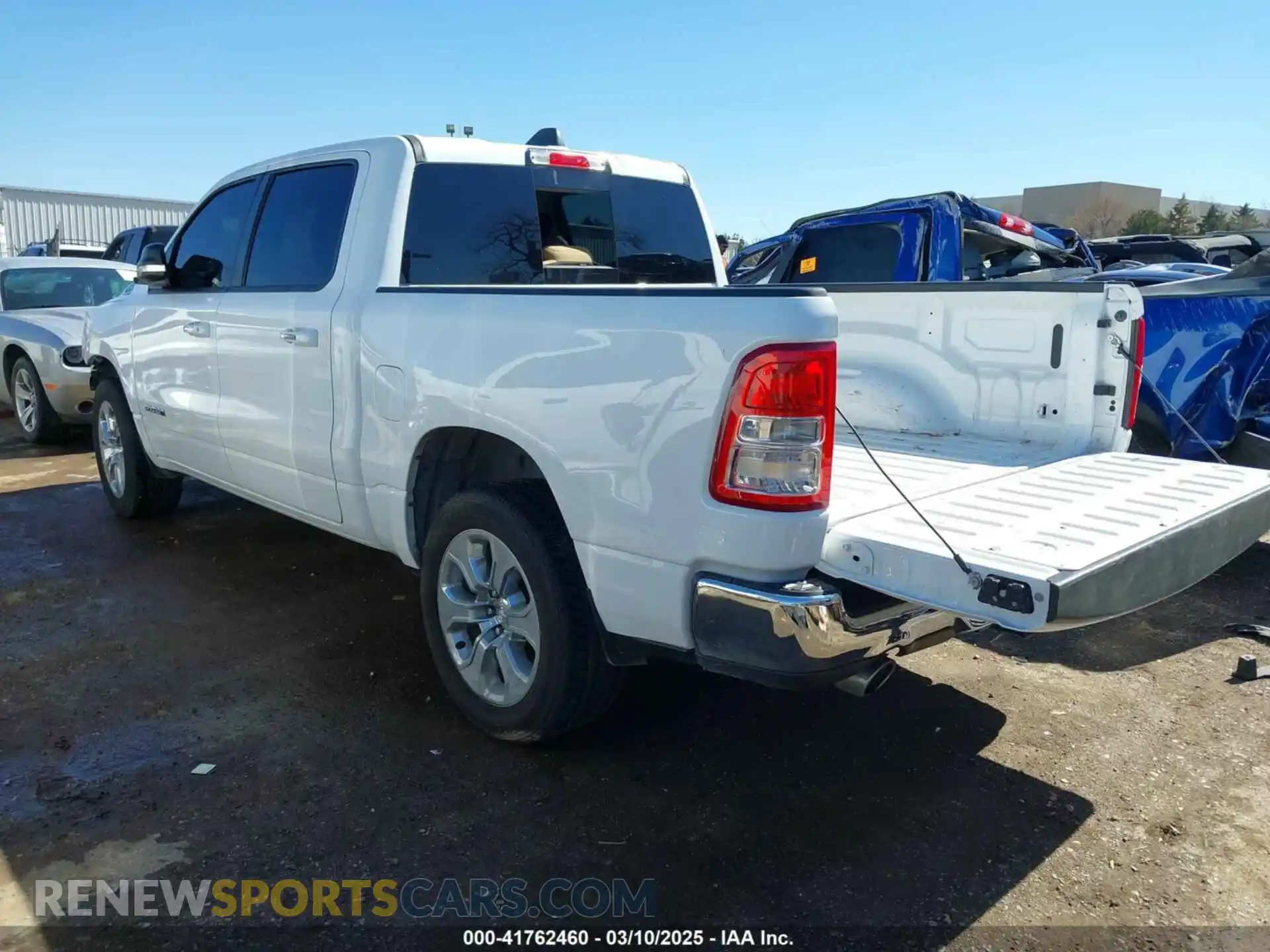3 Photograph of a damaged car 1C6RREFT0LN311731 RAM 1500 2020