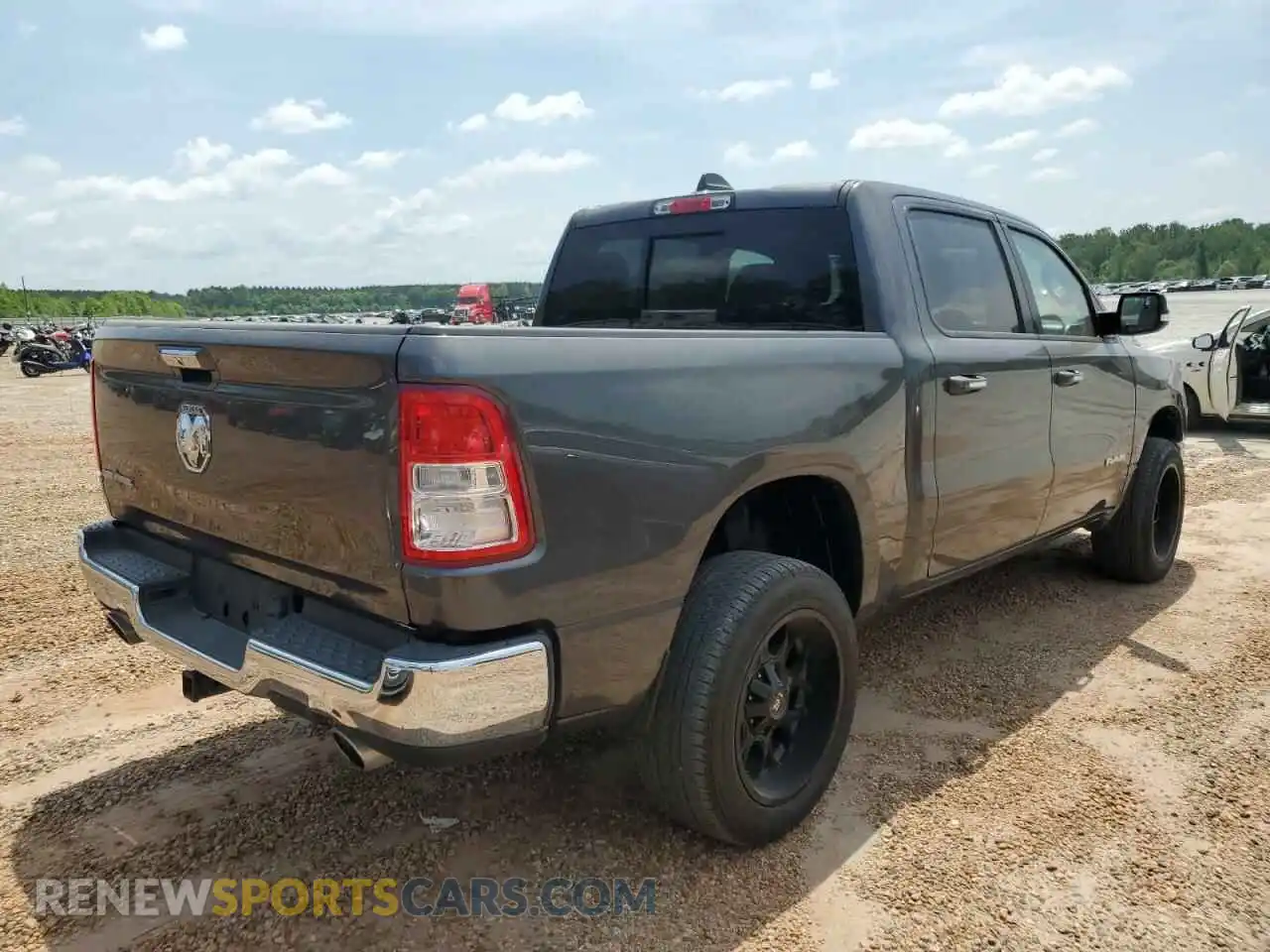 3 Photograph of a damaged car 1C6RREFT0LN406628 RAM 1500 2020