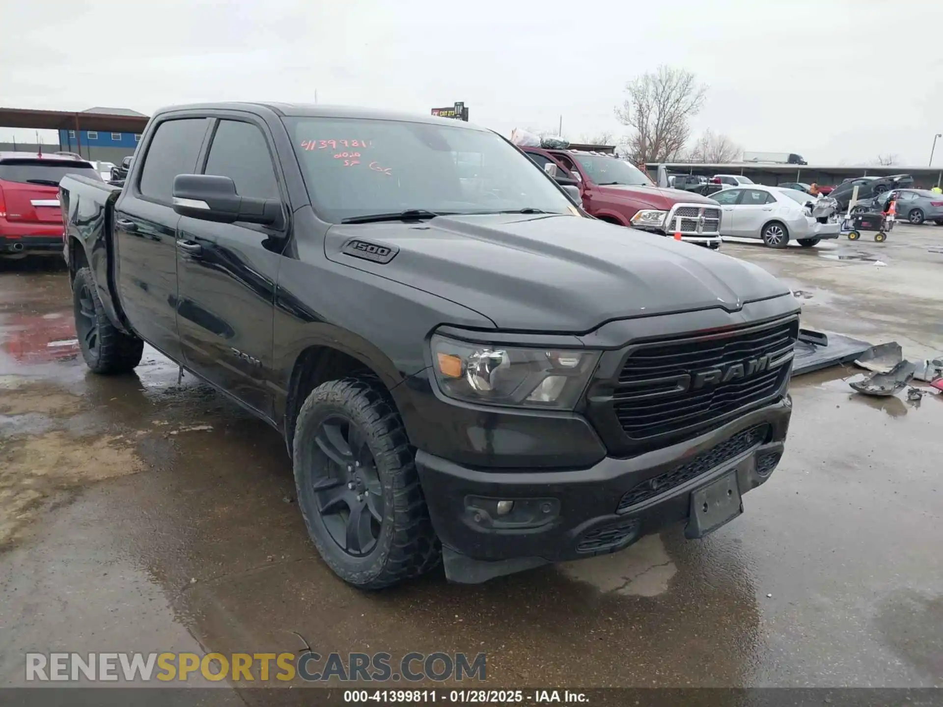1 Photograph of a damaged car 1C6RREFT2LN245795 RAM 1500 2020