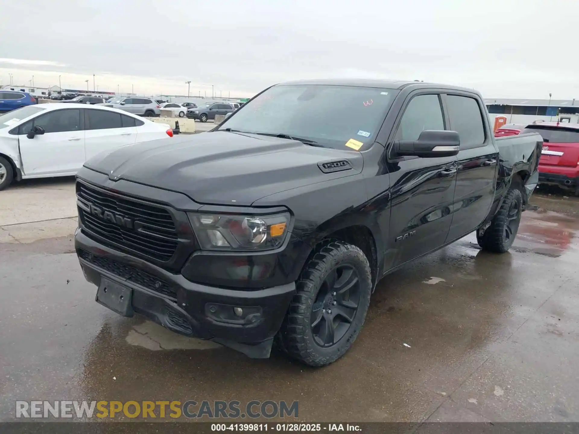 2 Photograph of a damaged car 1C6RREFT2LN245795 RAM 1500 2020