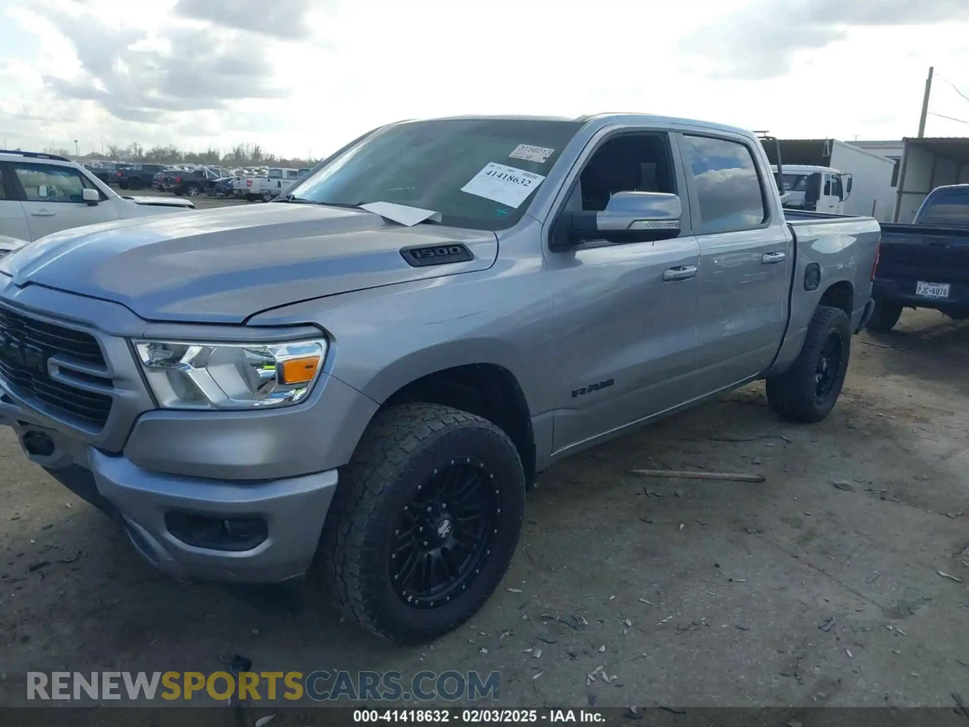 2 Photograph of a damaged car 1C6RREFT3LN188667 RAM 1500 2020