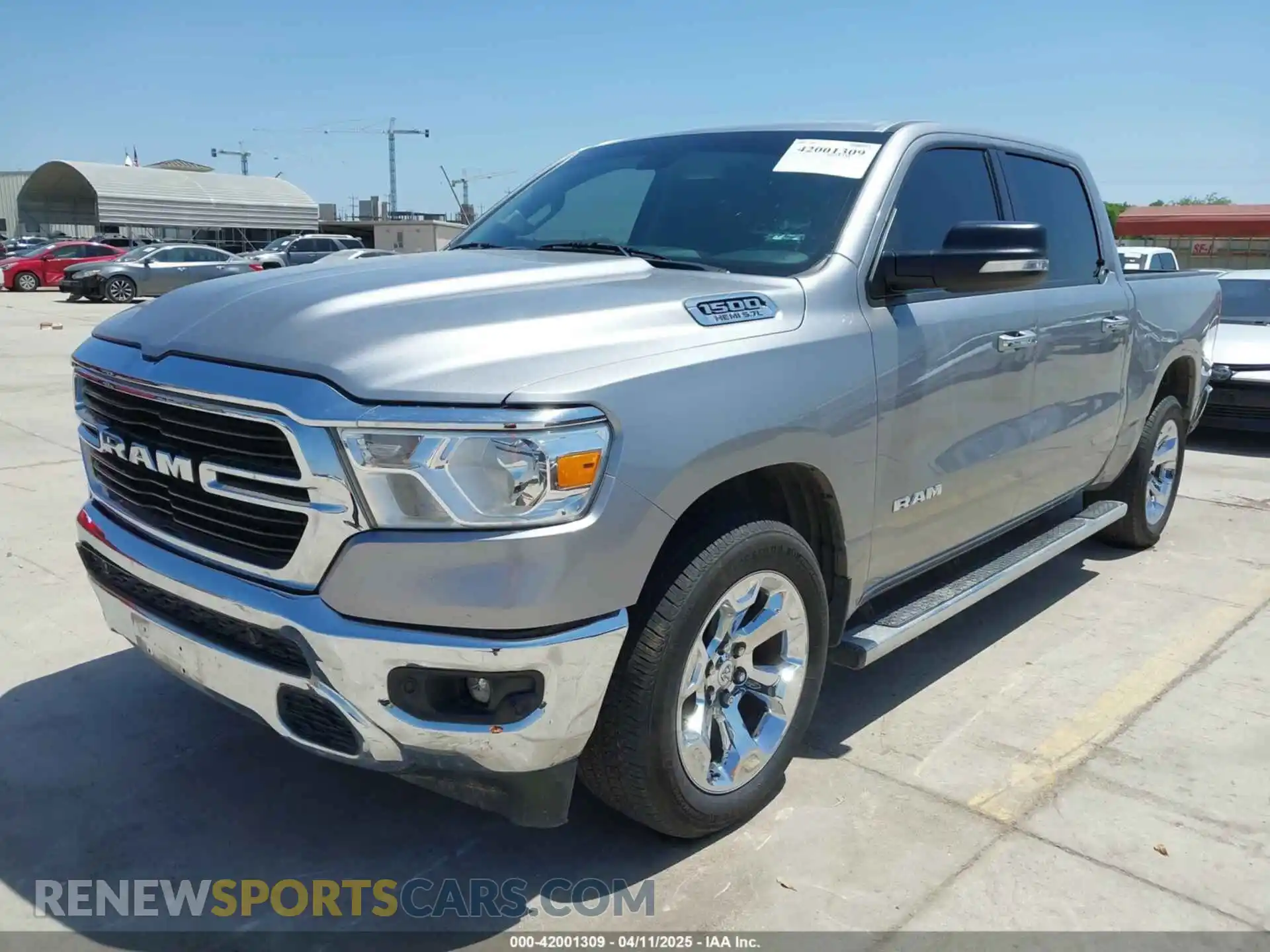 2 Photograph of a damaged car 1C6RREFT3LN321573 RAM 1500 2020