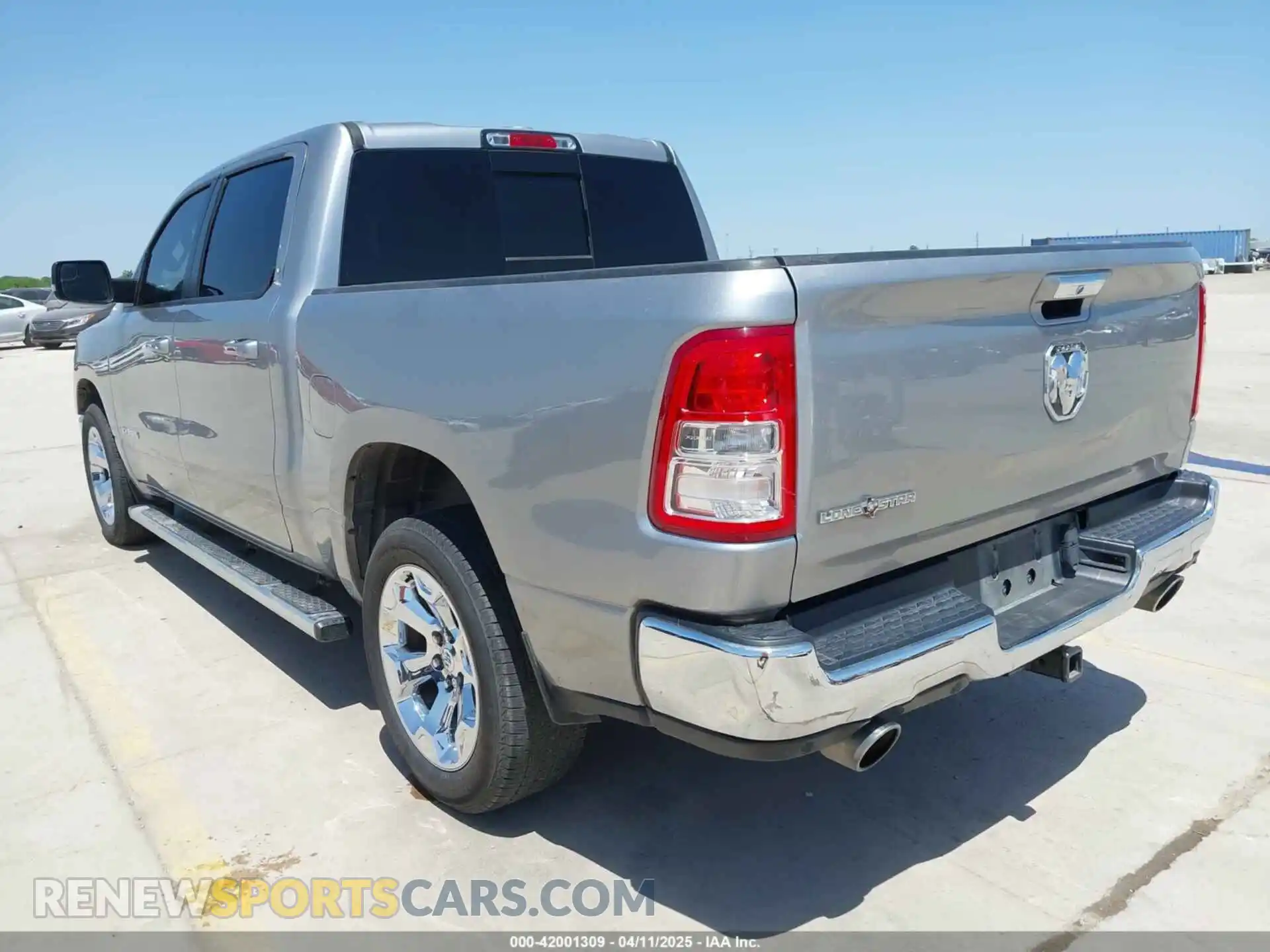 3 Photograph of a damaged car 1C6RREFT3LN321573 RAM 1500 2020