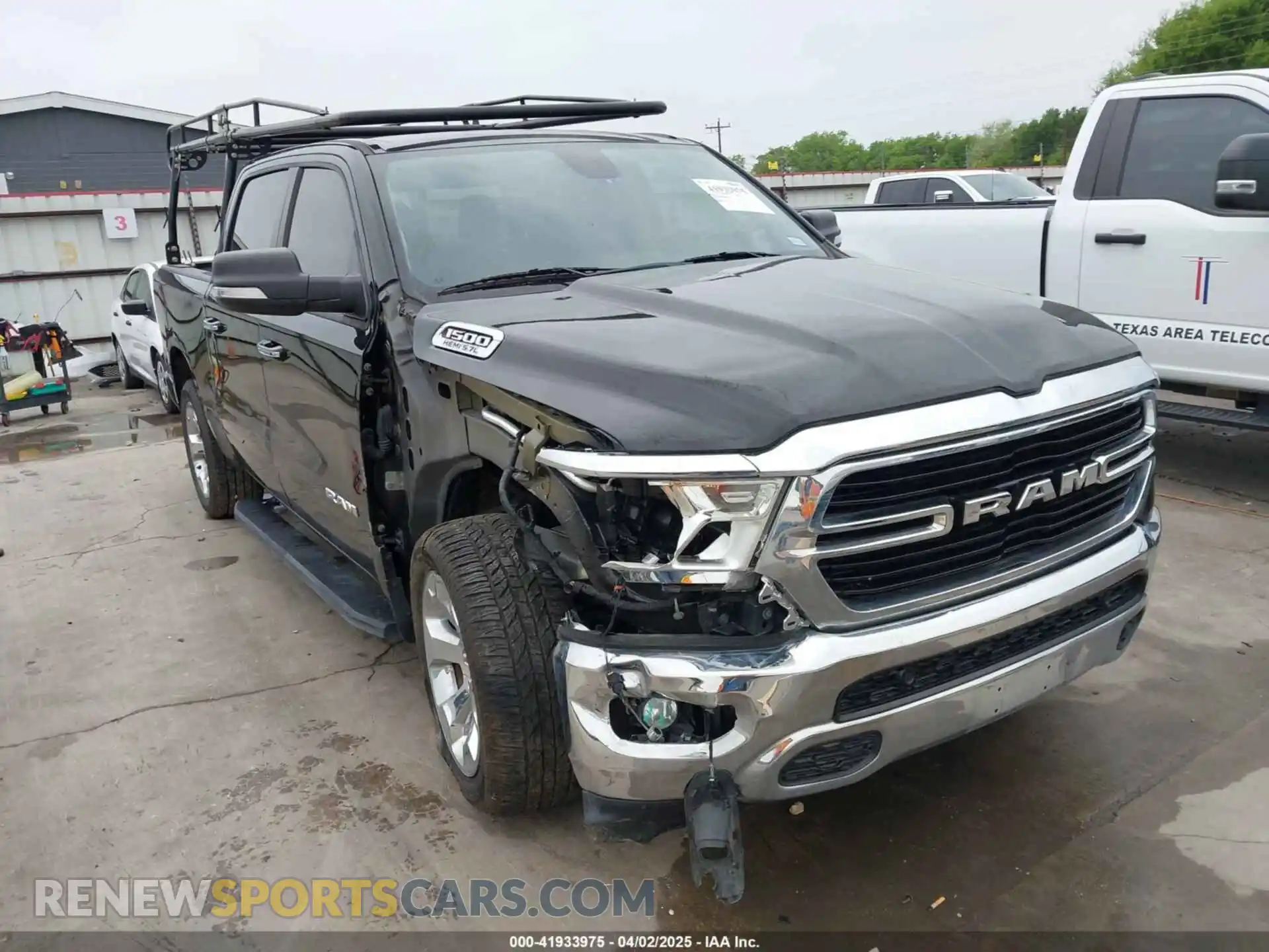1 Photograph of a damaged car 1C6RREFT4LN119602 RAM 1500 2020