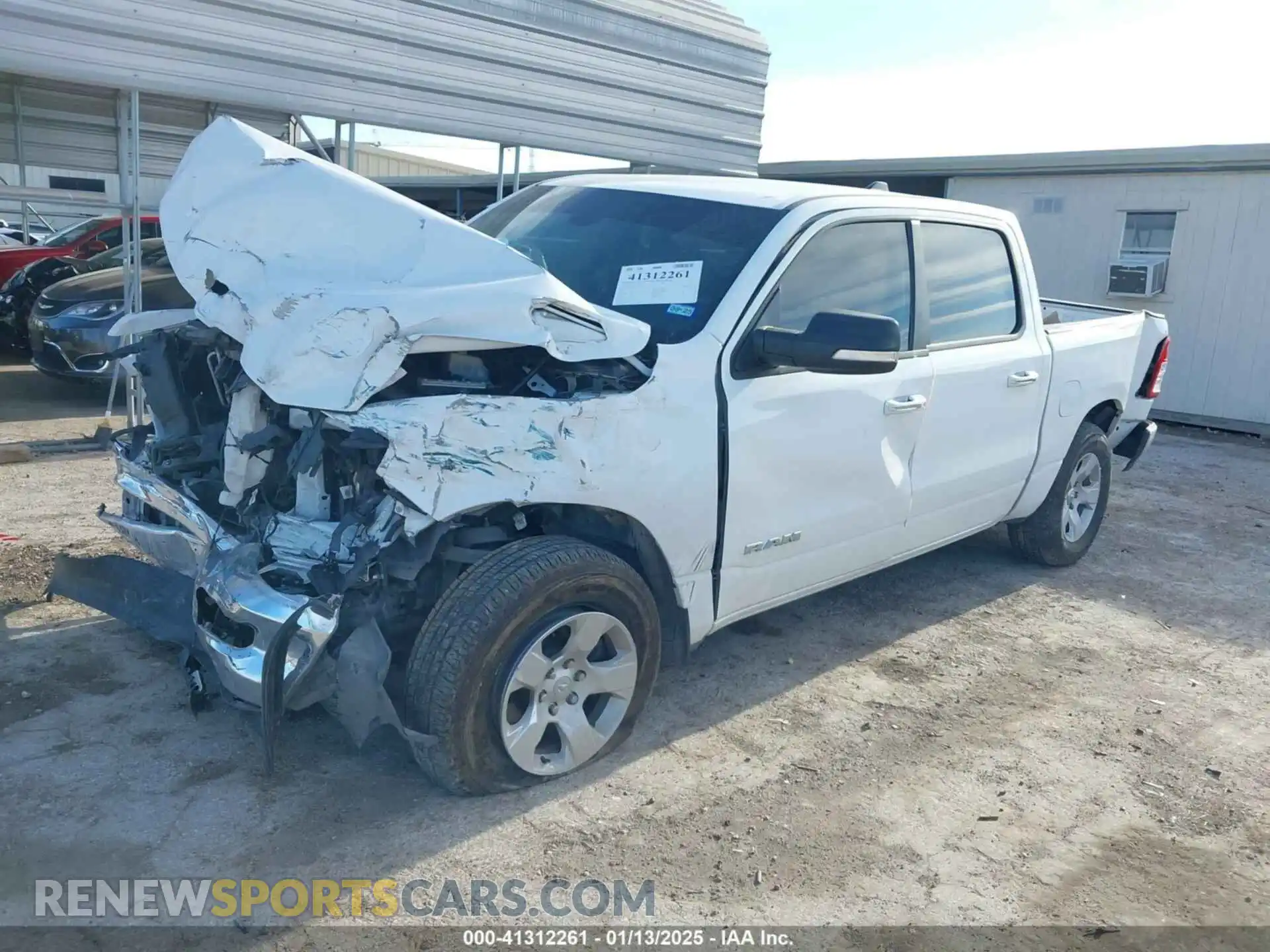 2 Photograph of a damaged car 1C6RREFT4LN333926 RAM 1500 2020