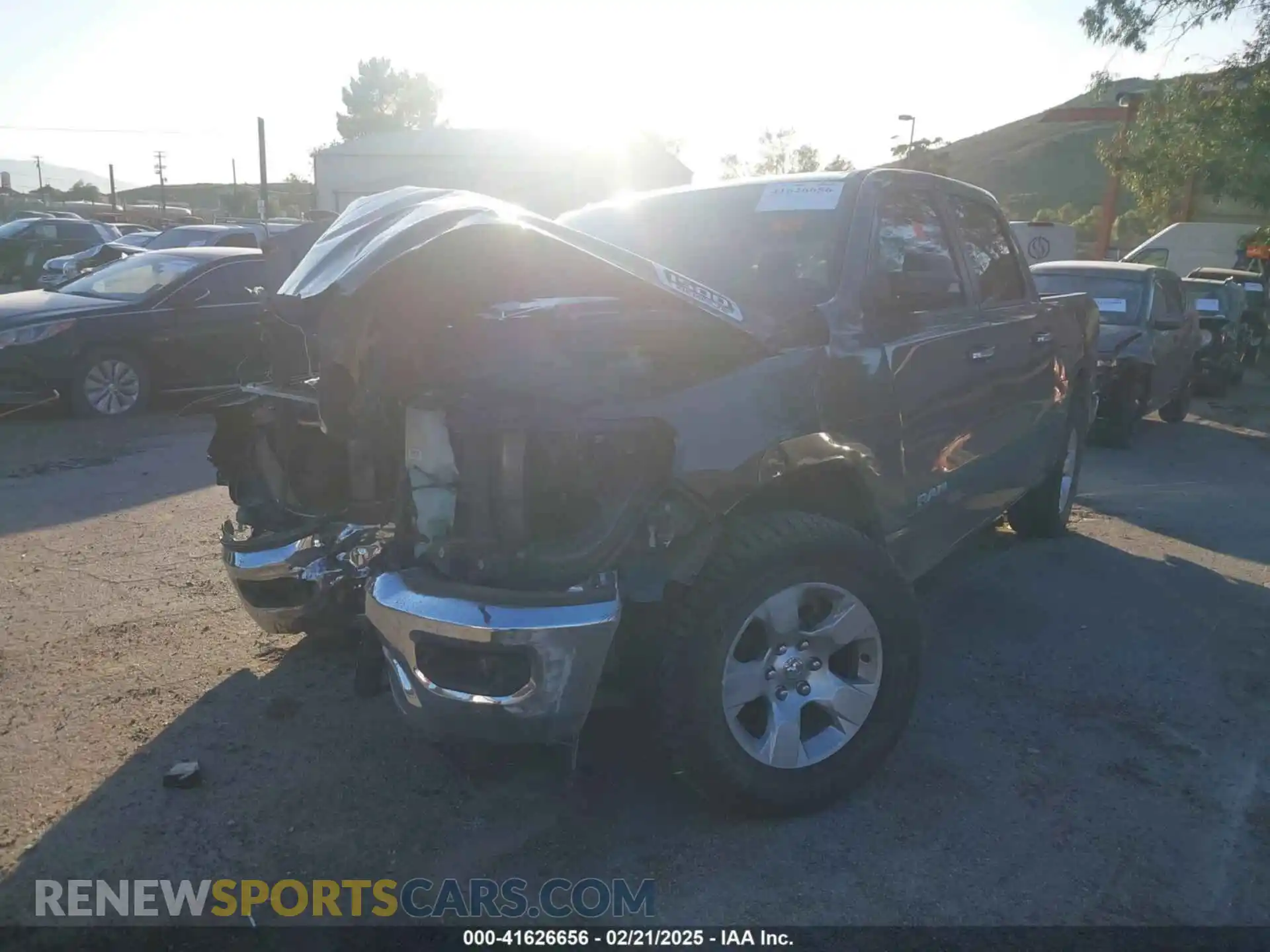 2 Photograph of a damaged car 1C6RREFT4LN372628 RAM 1500 2020