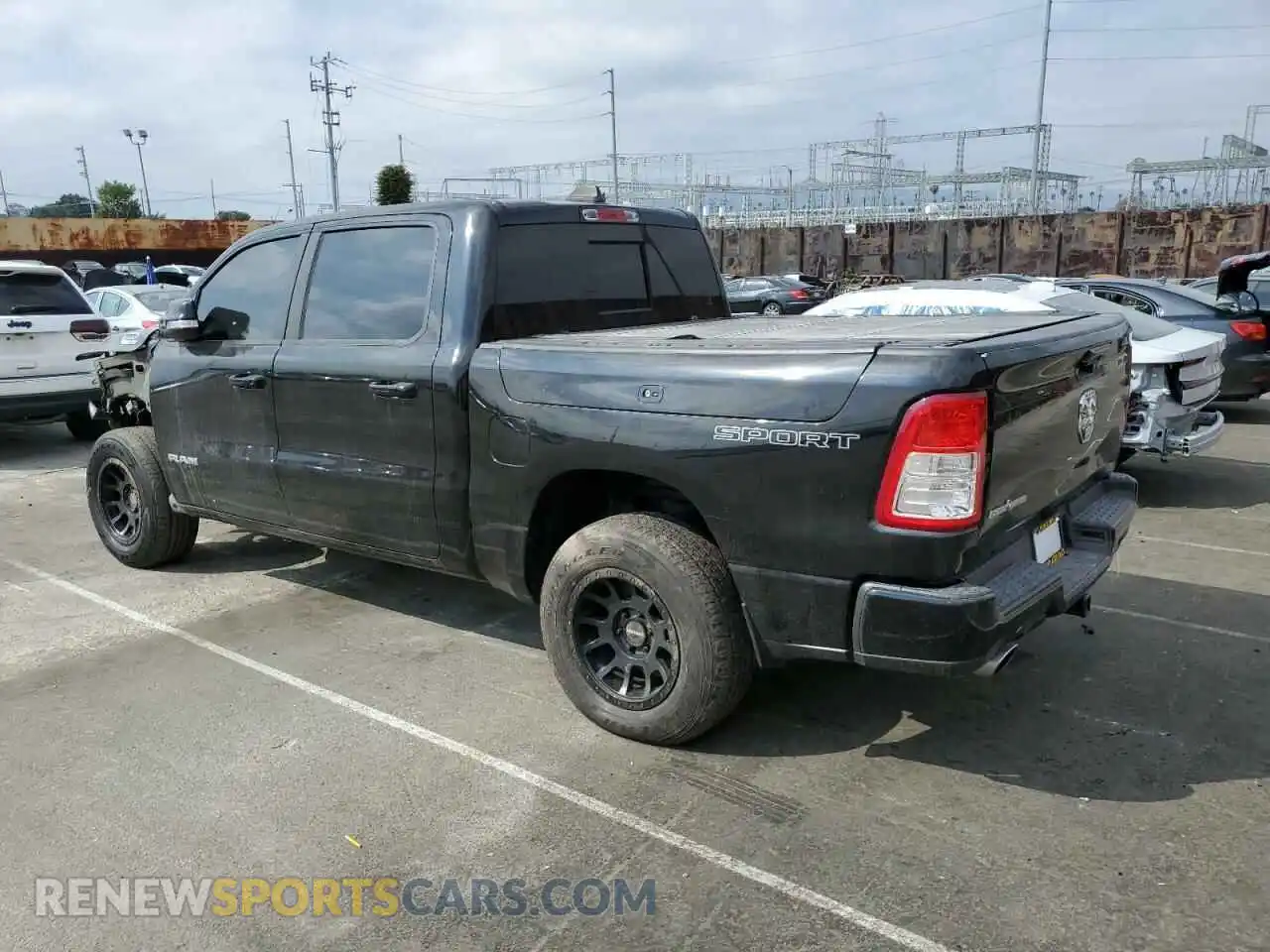 2 Photograph of a damaged car 1C6RREFT6LN152424 RAM 1500 2020