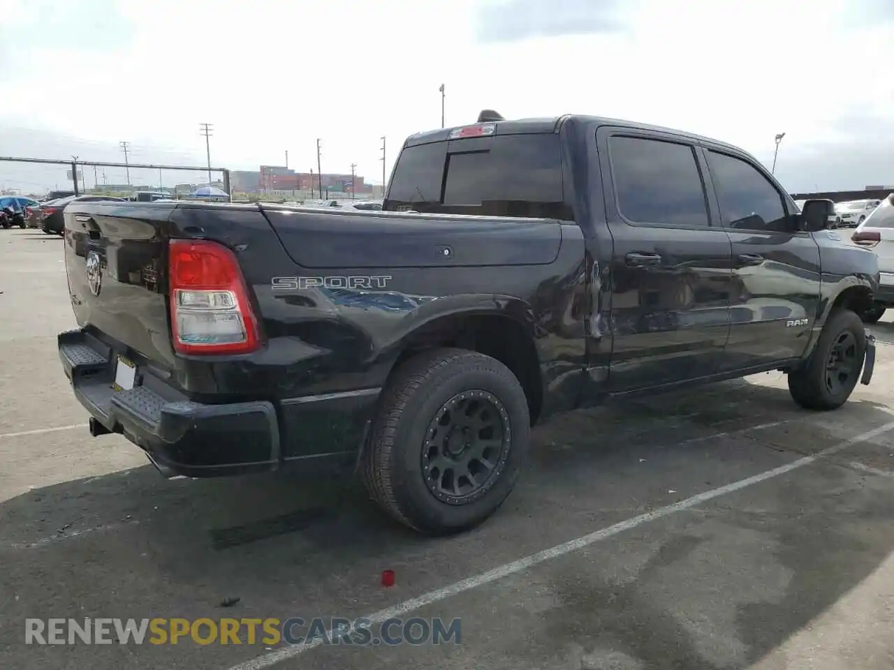 3 Photograph of a damaged car 1C6RREFT6LN152424 RAM 1500 2020