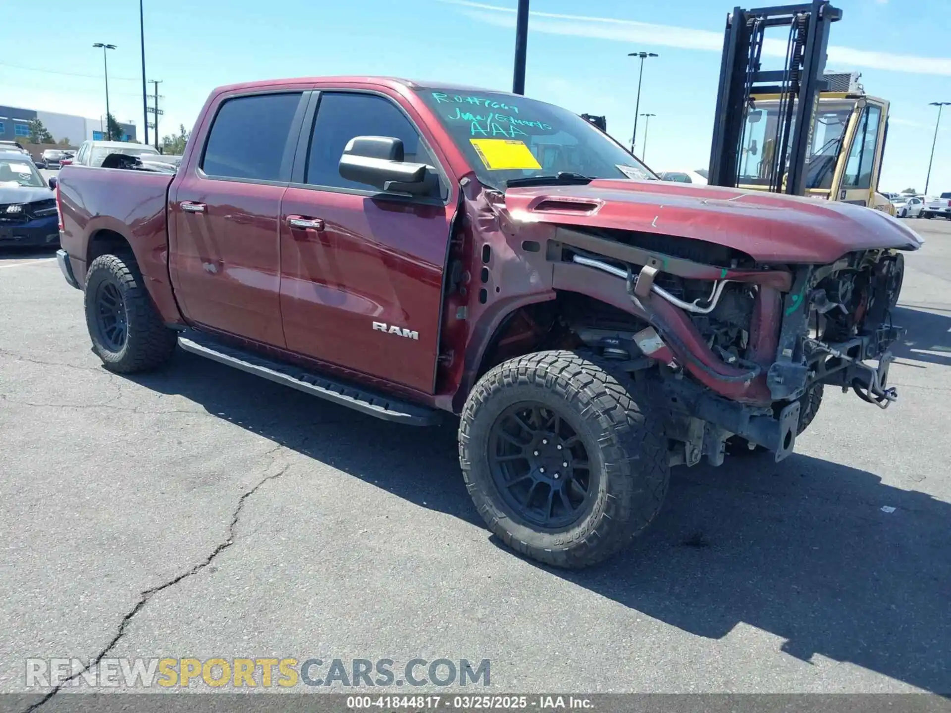 1 Photograph of a damaged car 1C6RREFT7LN105581 RAM 1500 2020
