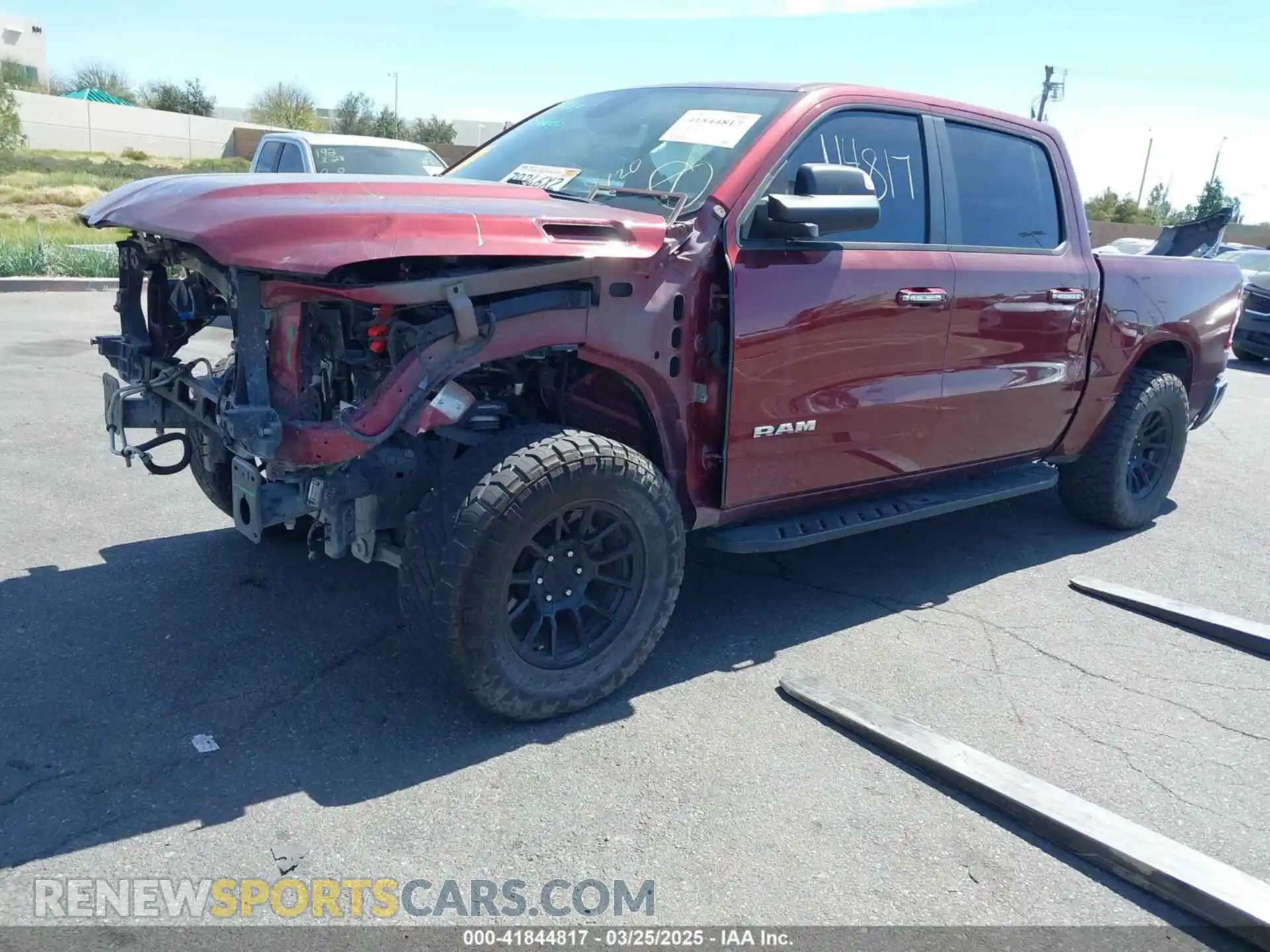 2 Photograph of a damaged car 1C6RREFT7LN105581 RAM 1500 2020