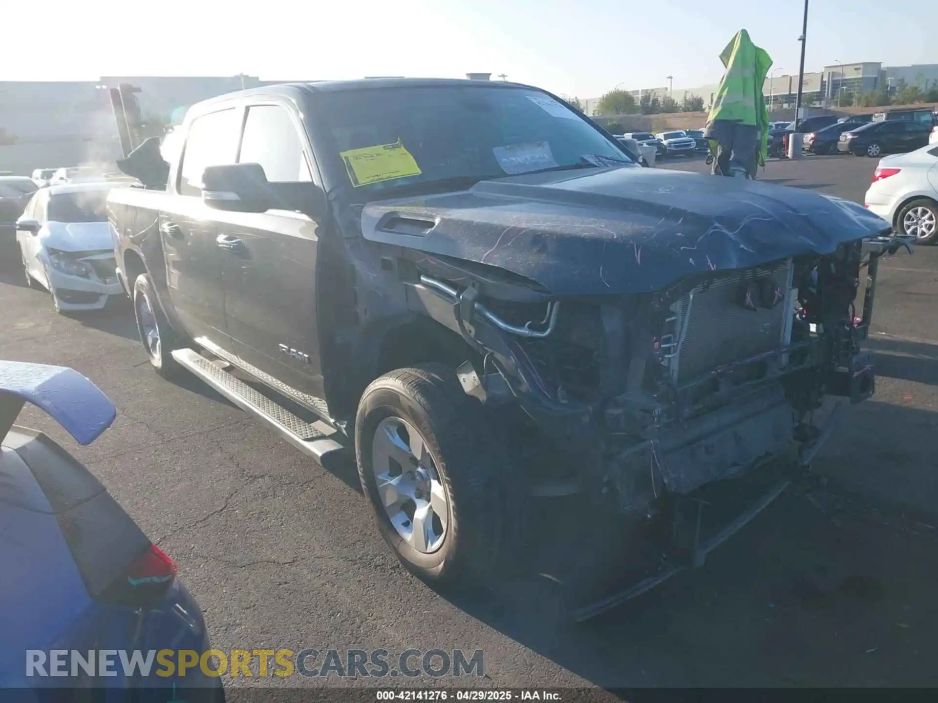 1 Photograph of a damaged car 1C6RREFT7LN401927 RAM 1500 2020