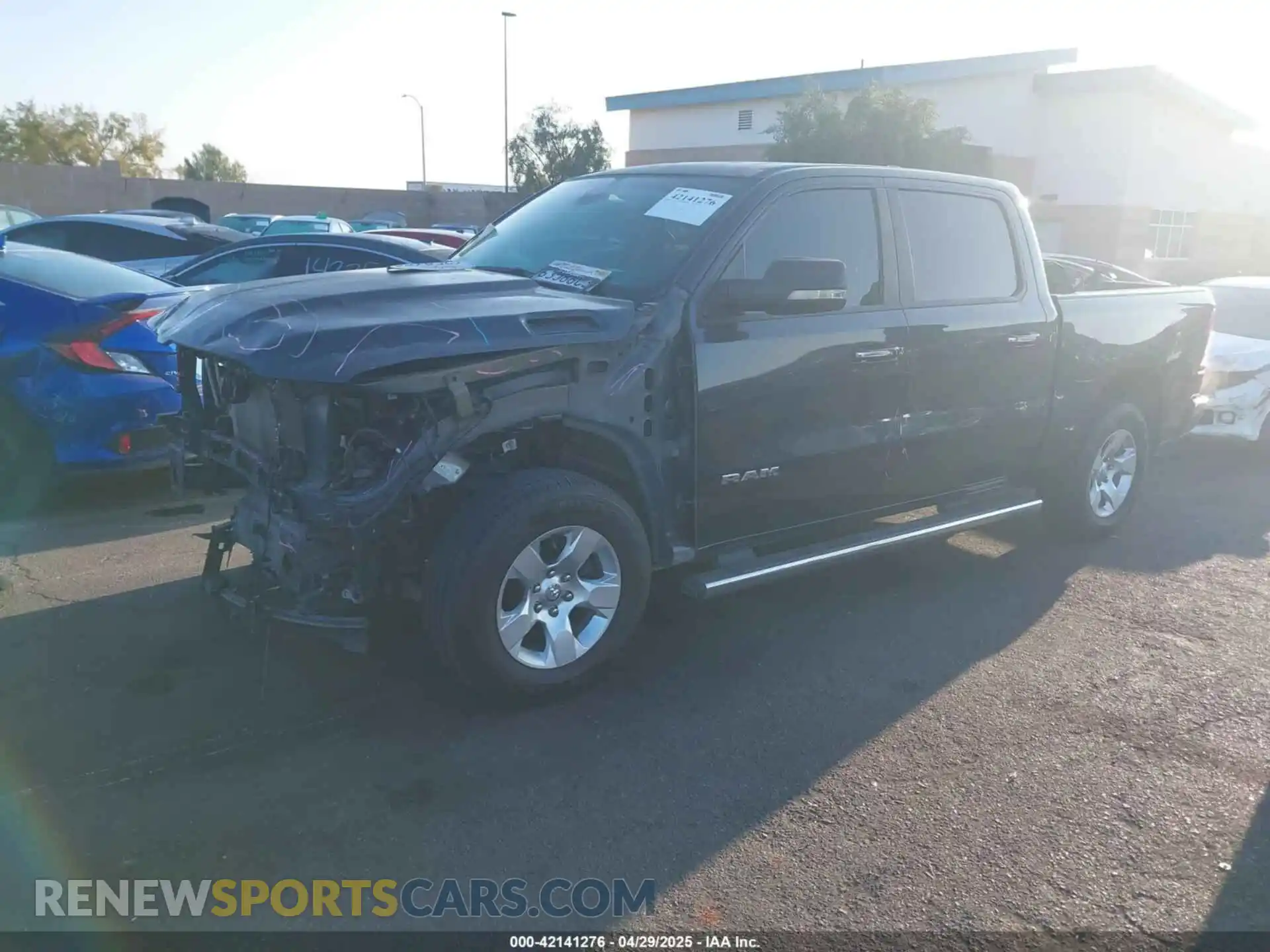 2 Photograph of a damaged car 1C6RREFT7LN401927 RAM 1500 2020