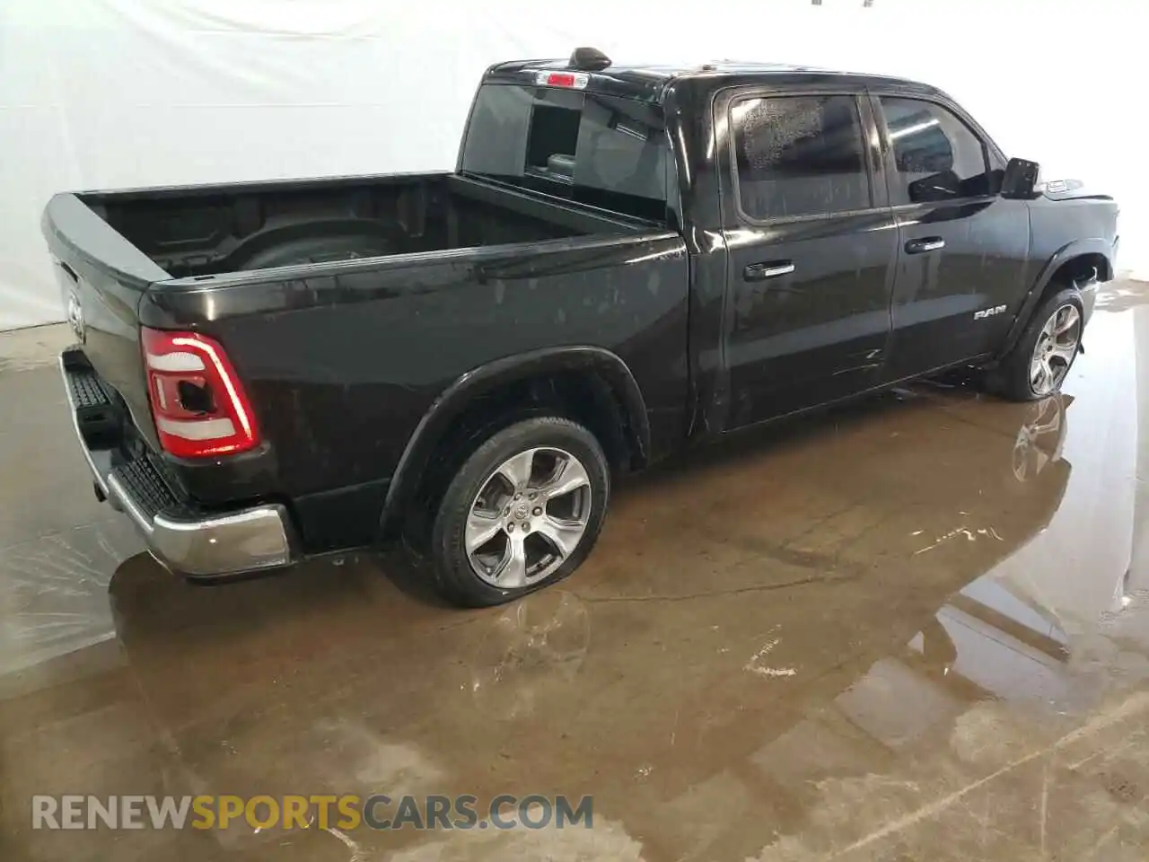 3 Photograph of a damaged car 1C6RREJT0LN238318 RAM 1500 2020