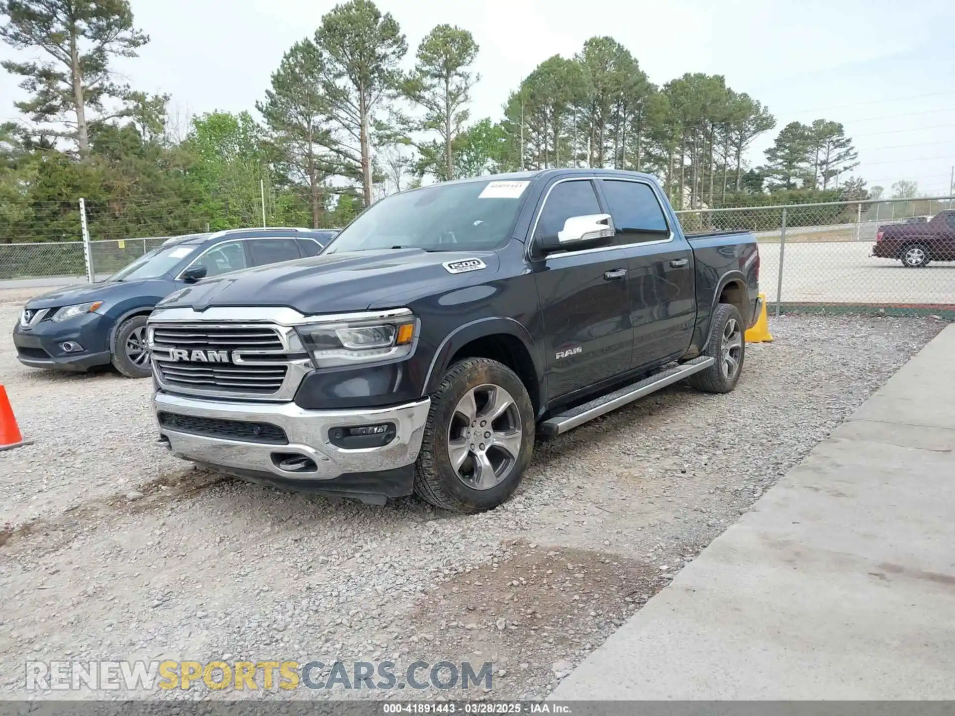 2 Photograph of a damaged car 1C6RREJT1LN105809 RAM 1500 2020