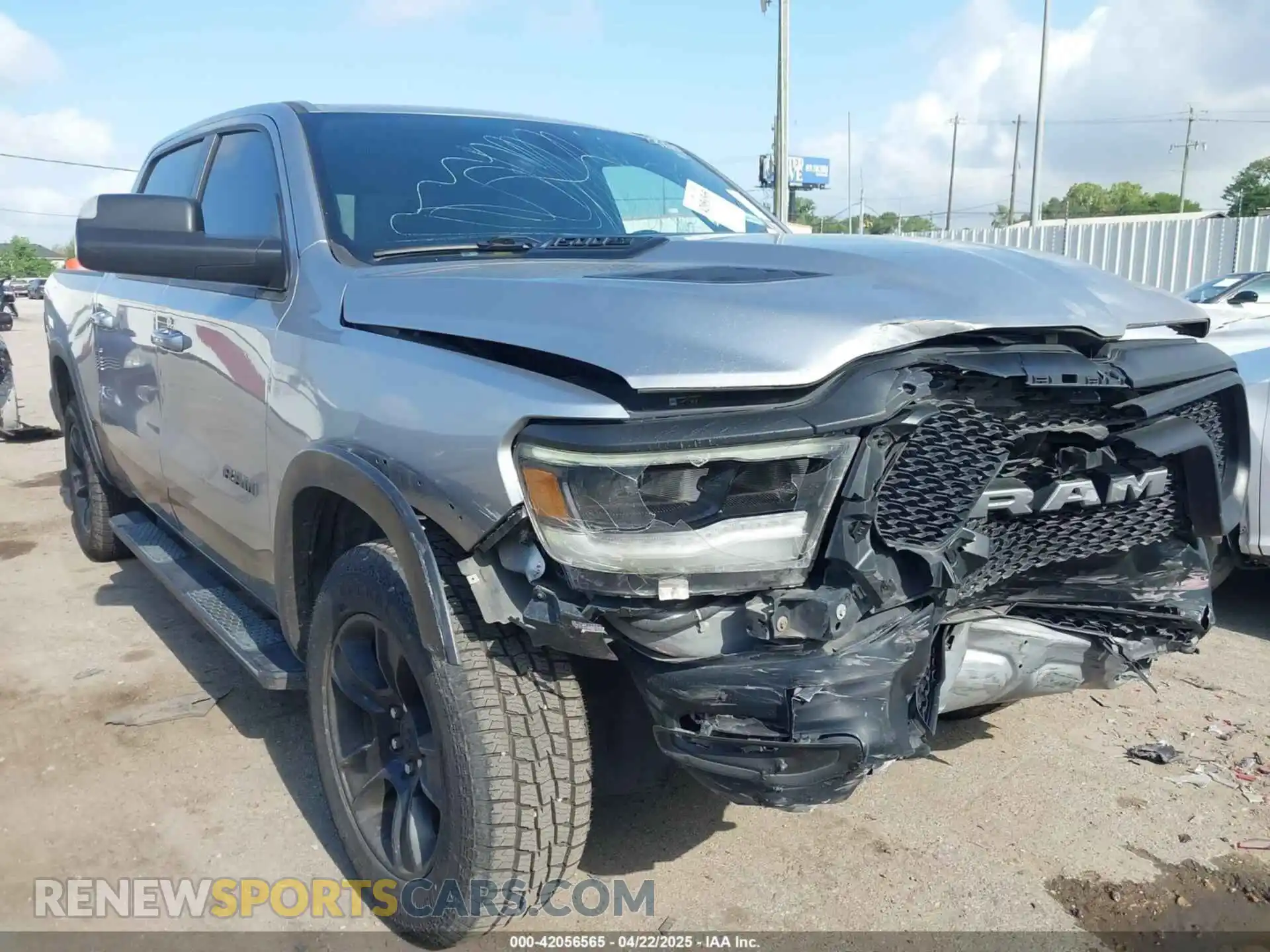 1 Photograph of a damaged car 1C6RRELT4LN267060 RAM 1500 2020