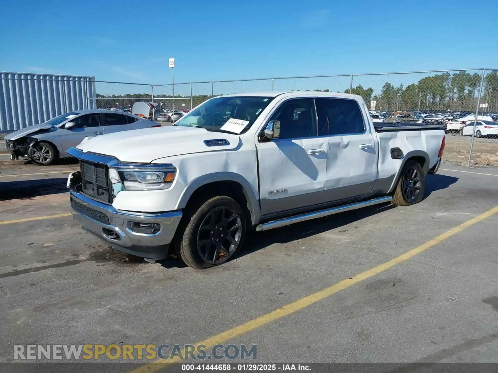 2 Photograph of a damaged car 1C6RRERT7LN289304 RAM 1500 2020