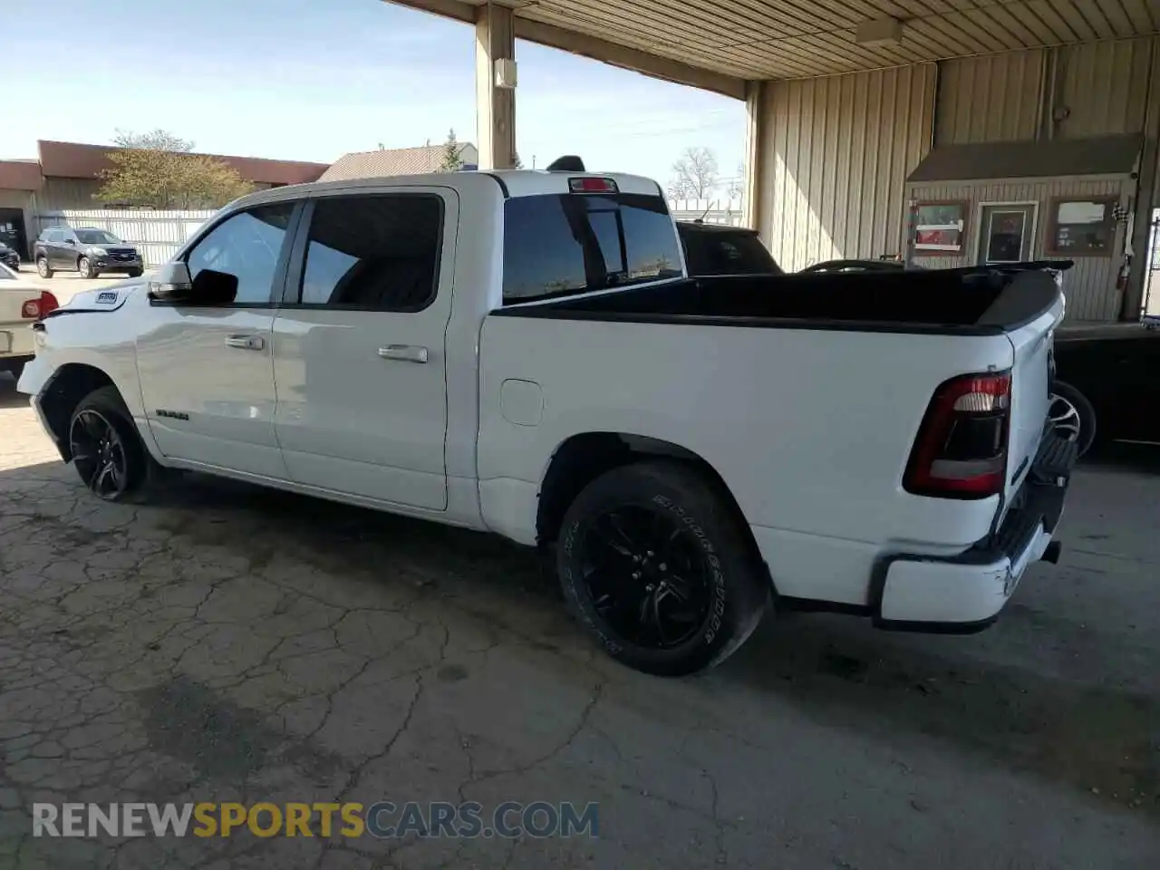 2 Photograph of a damaged car 1C6RRFFG0LN288573 RAM 1500 2020